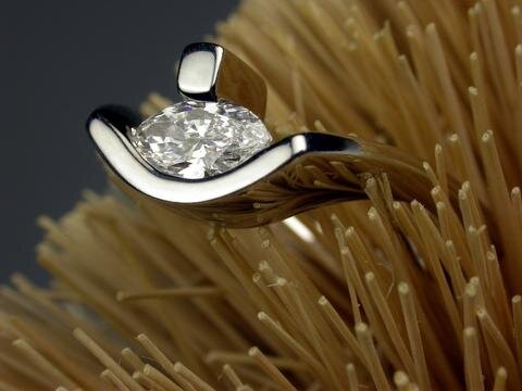The marquise shape takes on an Ancient Egyptian inspired Art Deco vibe in this creation by Secrète owner Elyahu Araki. We recently remade this treasure from our catalog with sapphire accents for an artistic young couple from New York.