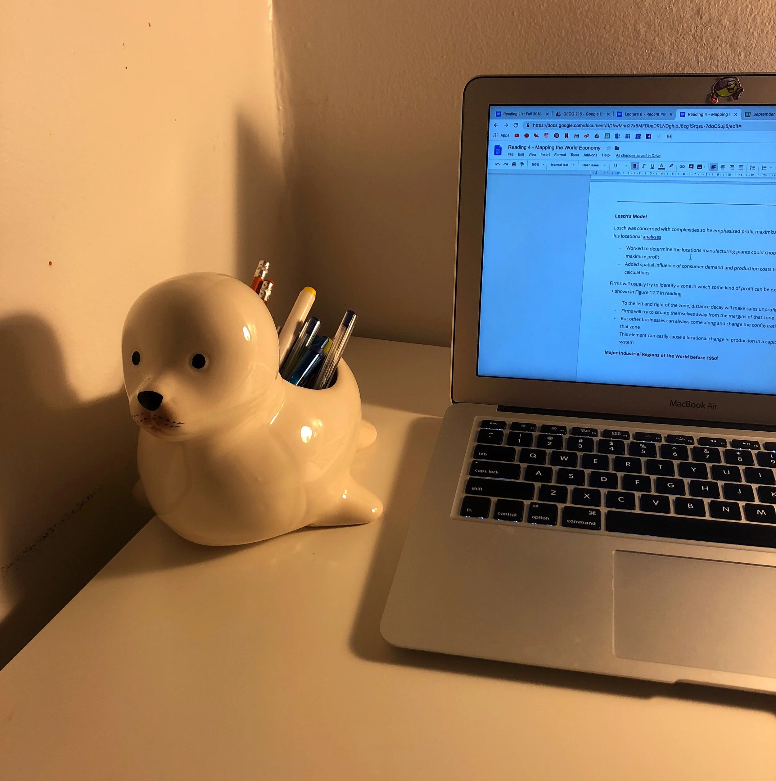 computer screen and seal-shaped pencil holder