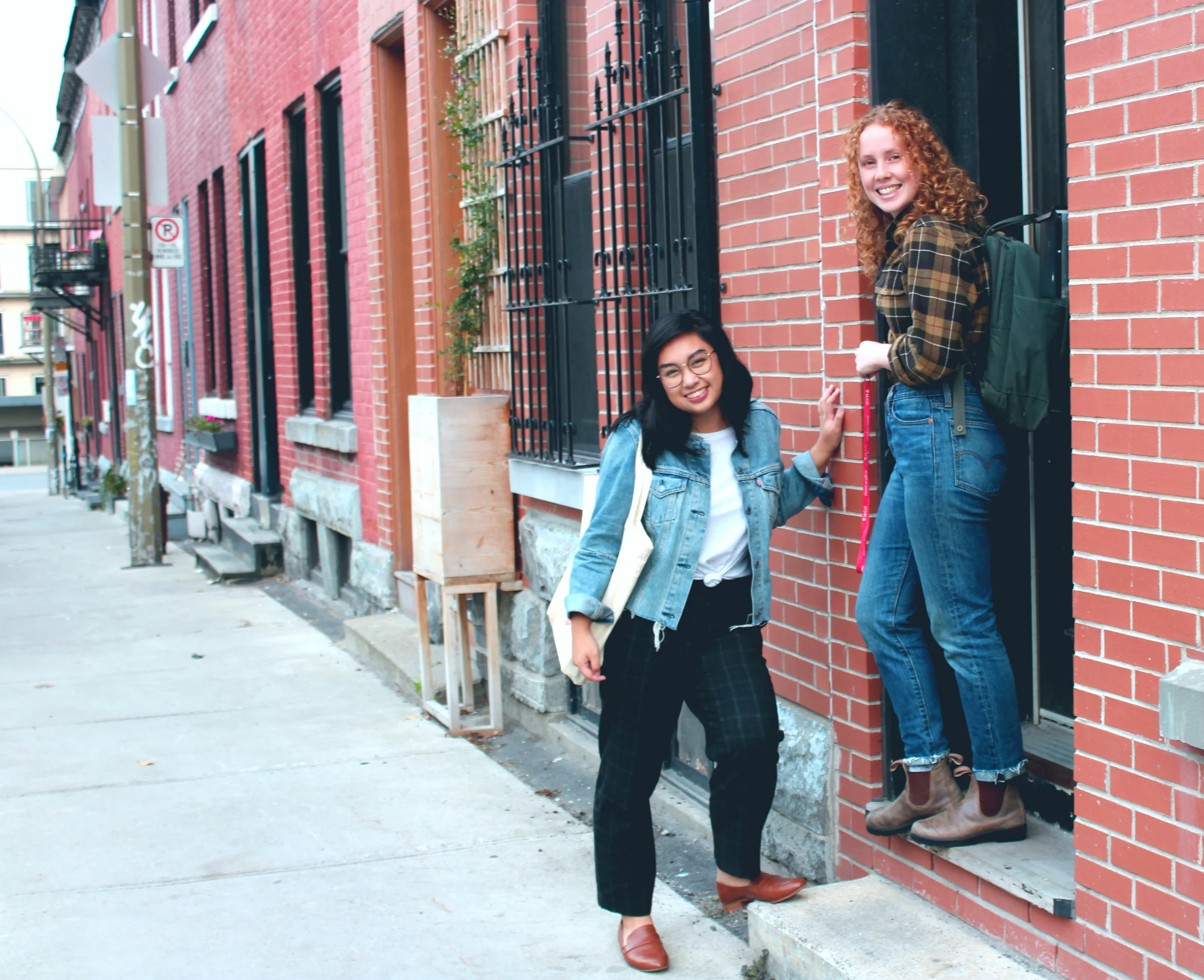 girls posing in outfits on stairwell on street