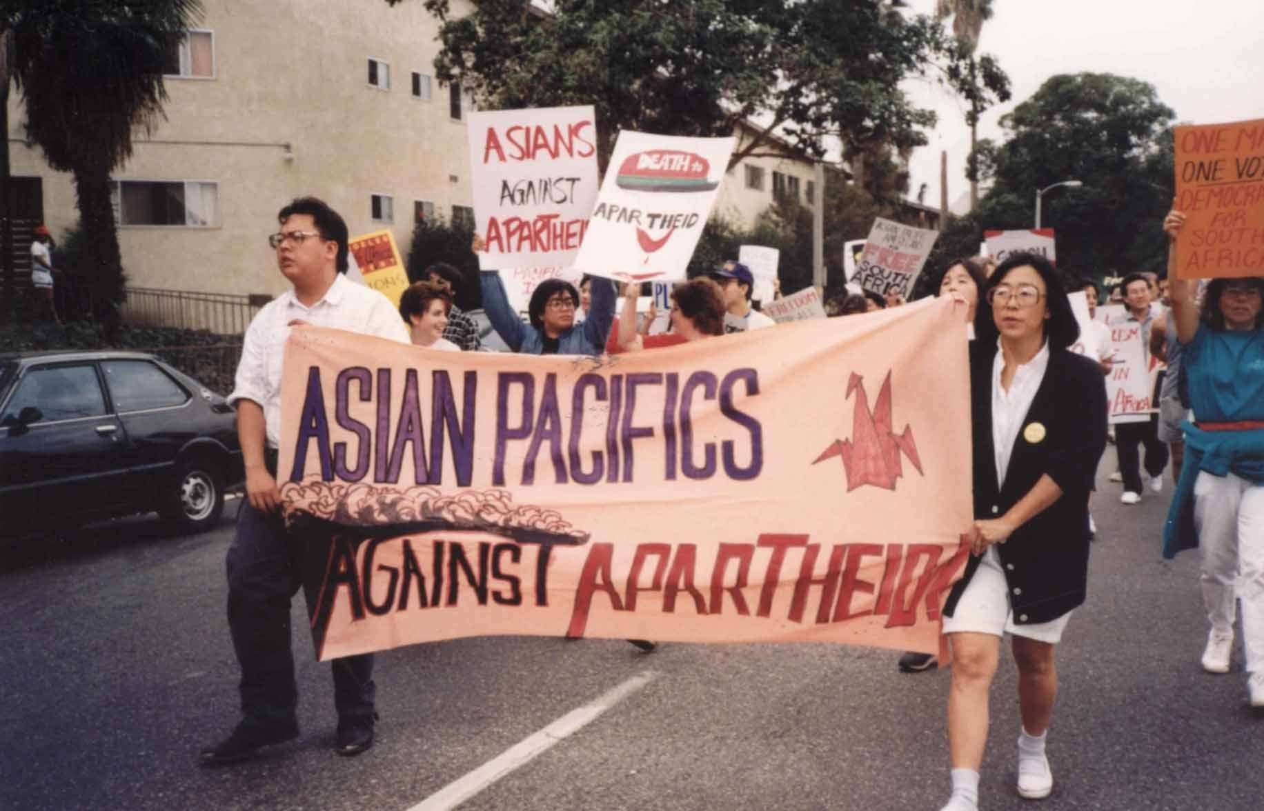 Kathy Masaoka marching in protest