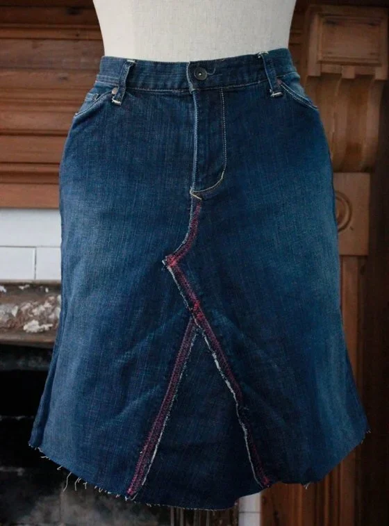 handmade denim skirt displayed on a mannequin