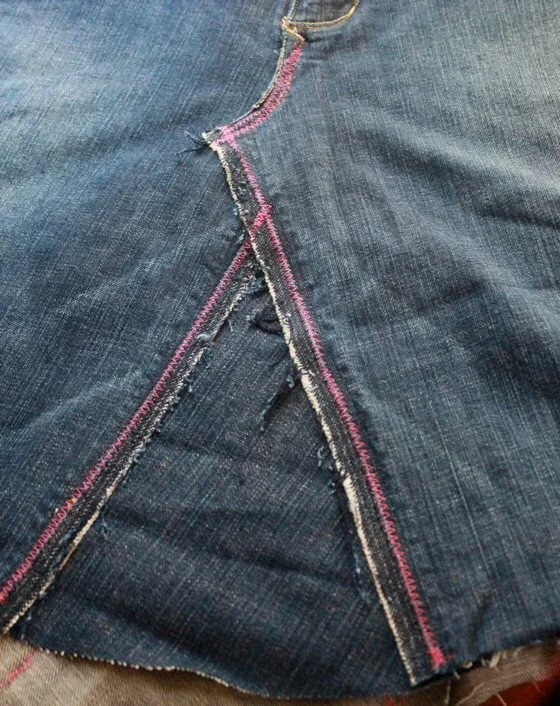 closeup of zig-zag stitching on a denim skirt