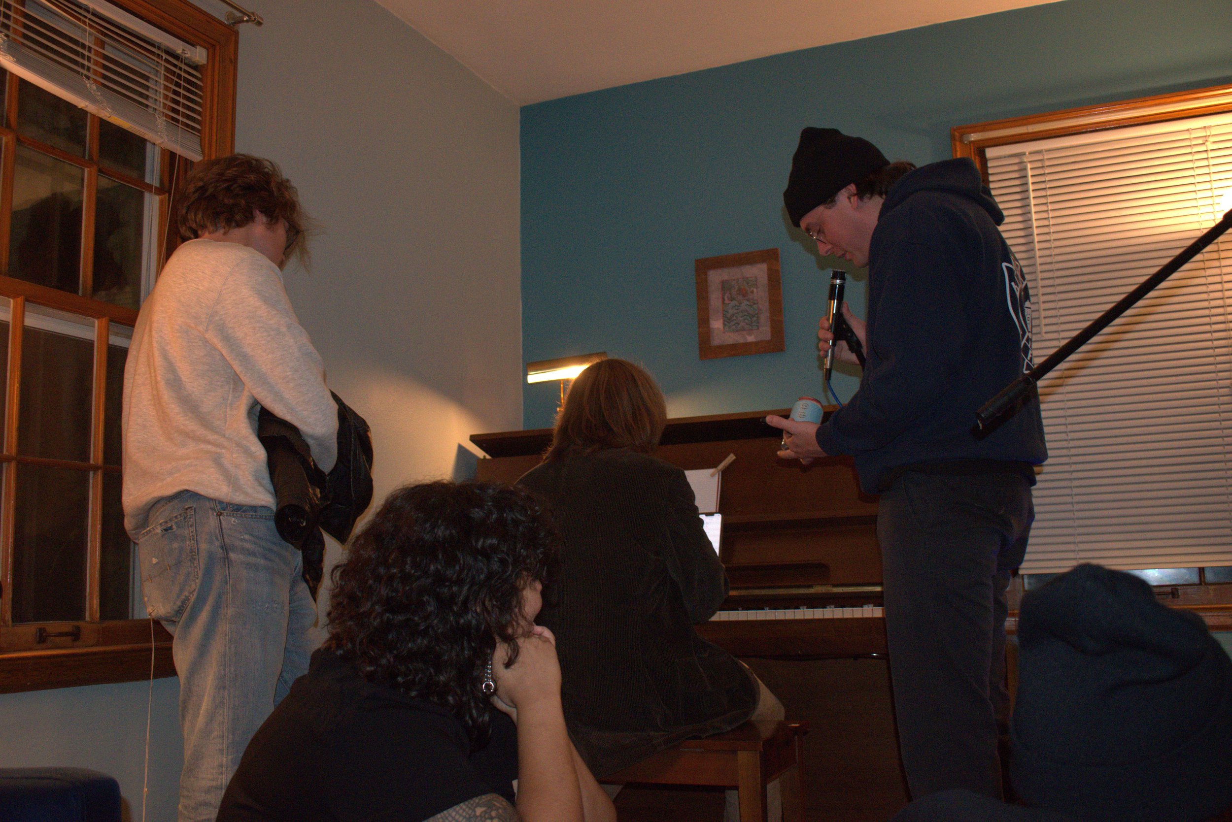 Neil-on-piano-with-guest.jpg