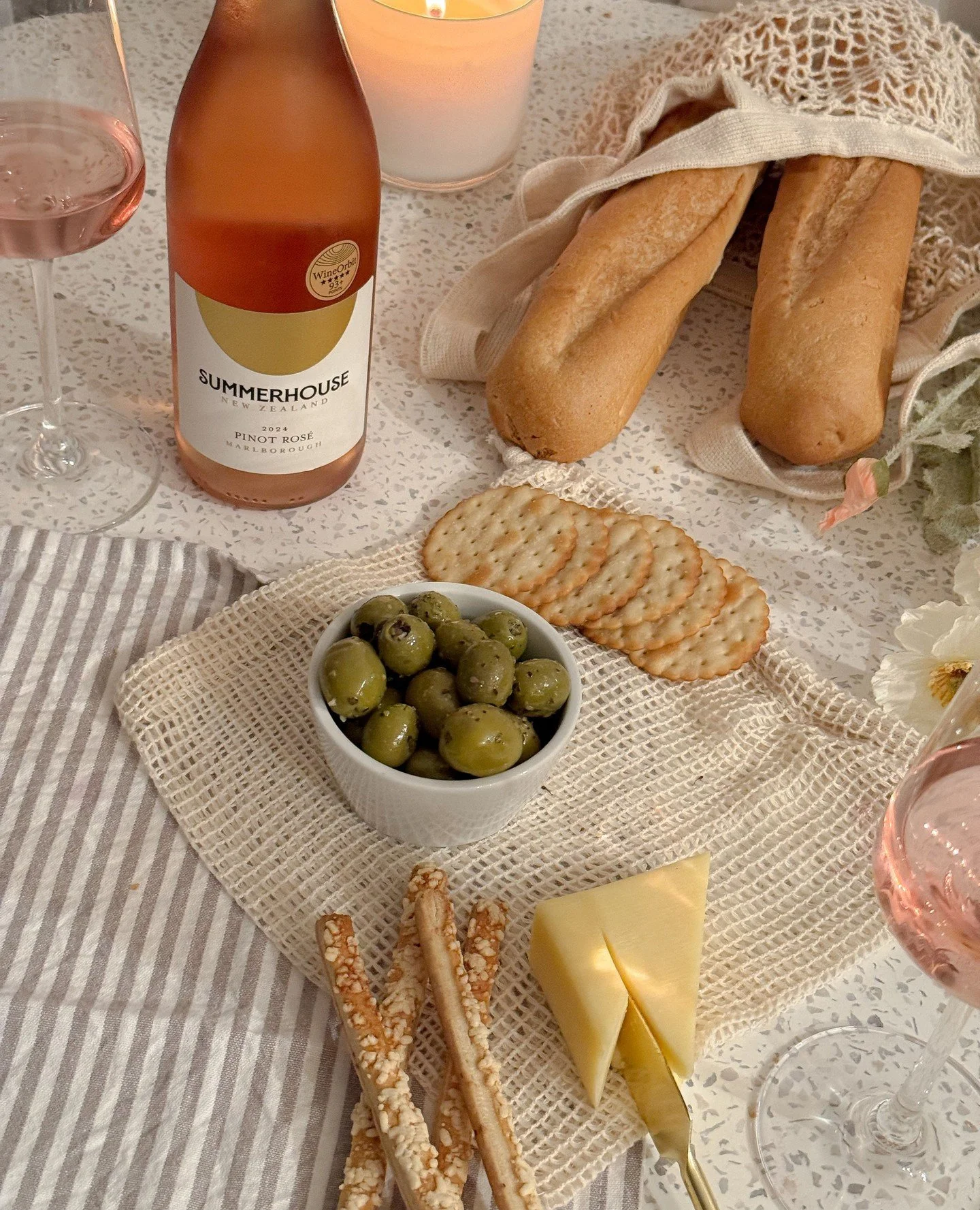 Ready to elevate your date night without leaving the house? Sip on some chilled Ros&eacute; and indulge in a platter full of your favourite snacks that will make your taste buds dance ✨️ Whether it's the perfect cheese, juicy fruits or savoury bites,