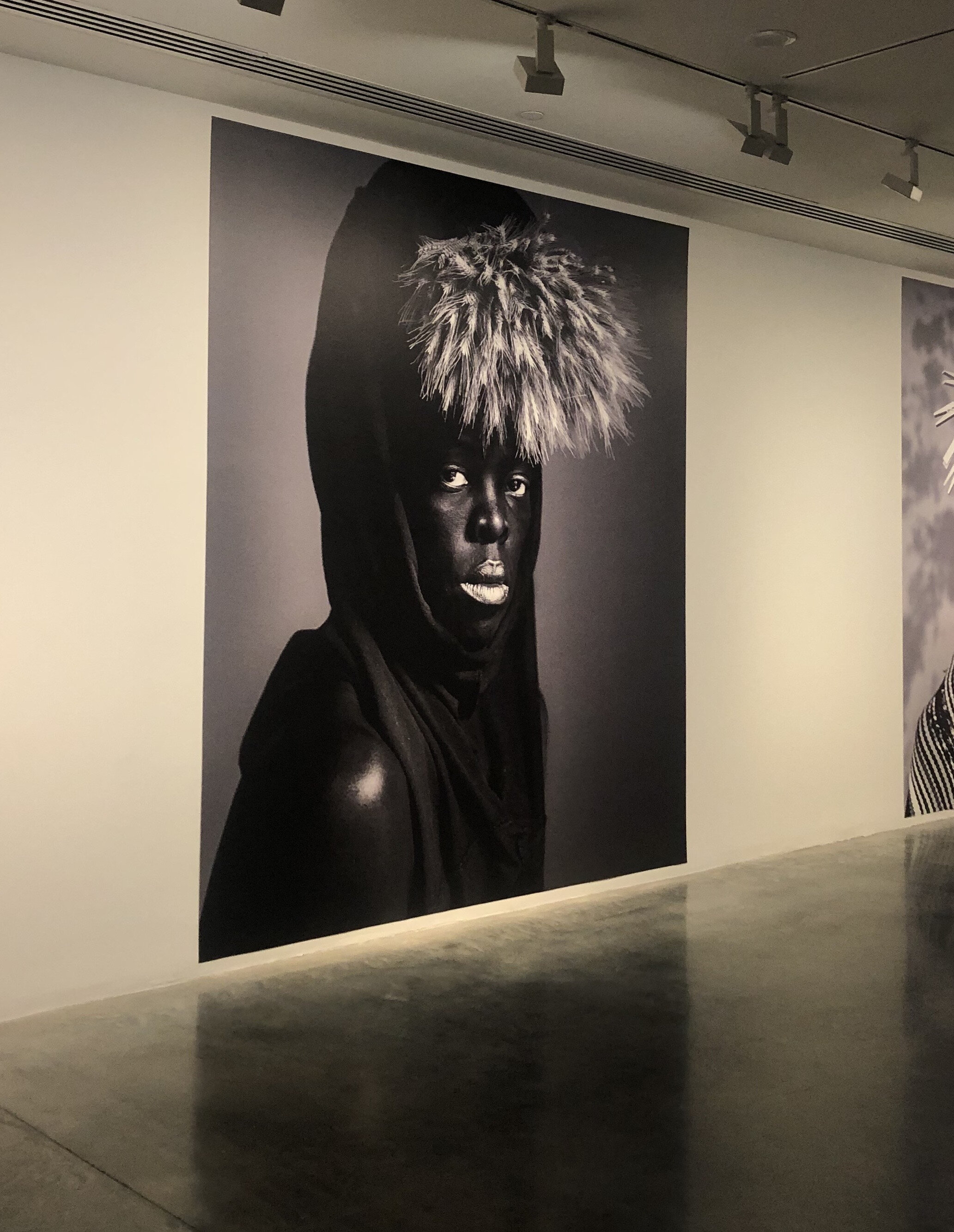  Zanele Muholi,  MaID IV, Newyork,  2018, Somnyama Ngonyama series, installation view, 22nd Biennale of Sydney: NIRIN, Museum of Contemporary Art Australia, Sydney, 2020.  Photo: Alexandra McDermott Brown 