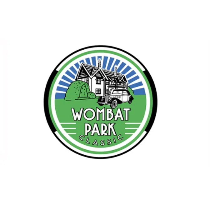 Logo for Wombat Park Classic featuring a house, a vintage car, and greenery inside a circular design.