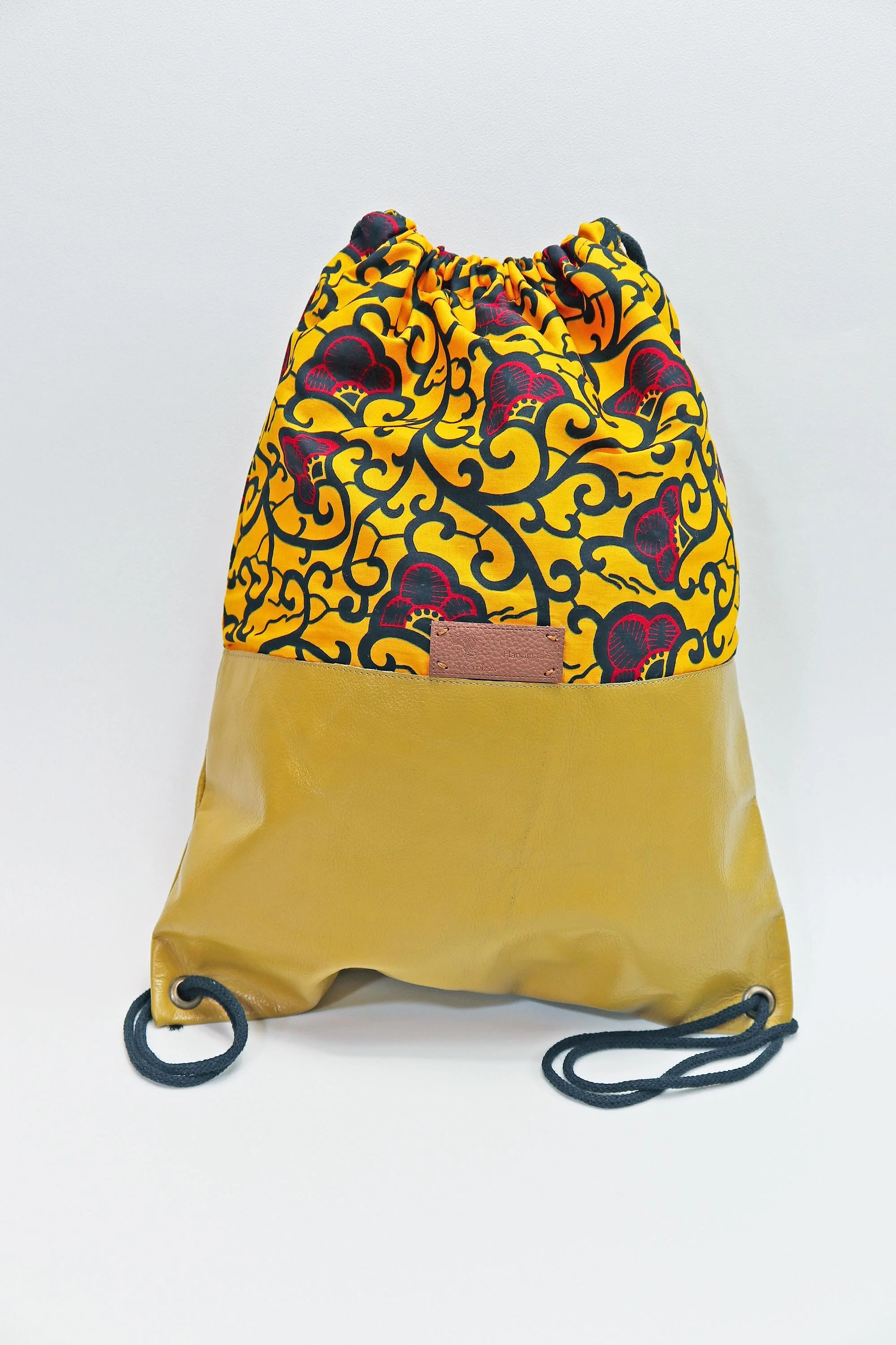 leather-print_drawstring_bag-onicha-filled_edited-1.jpg