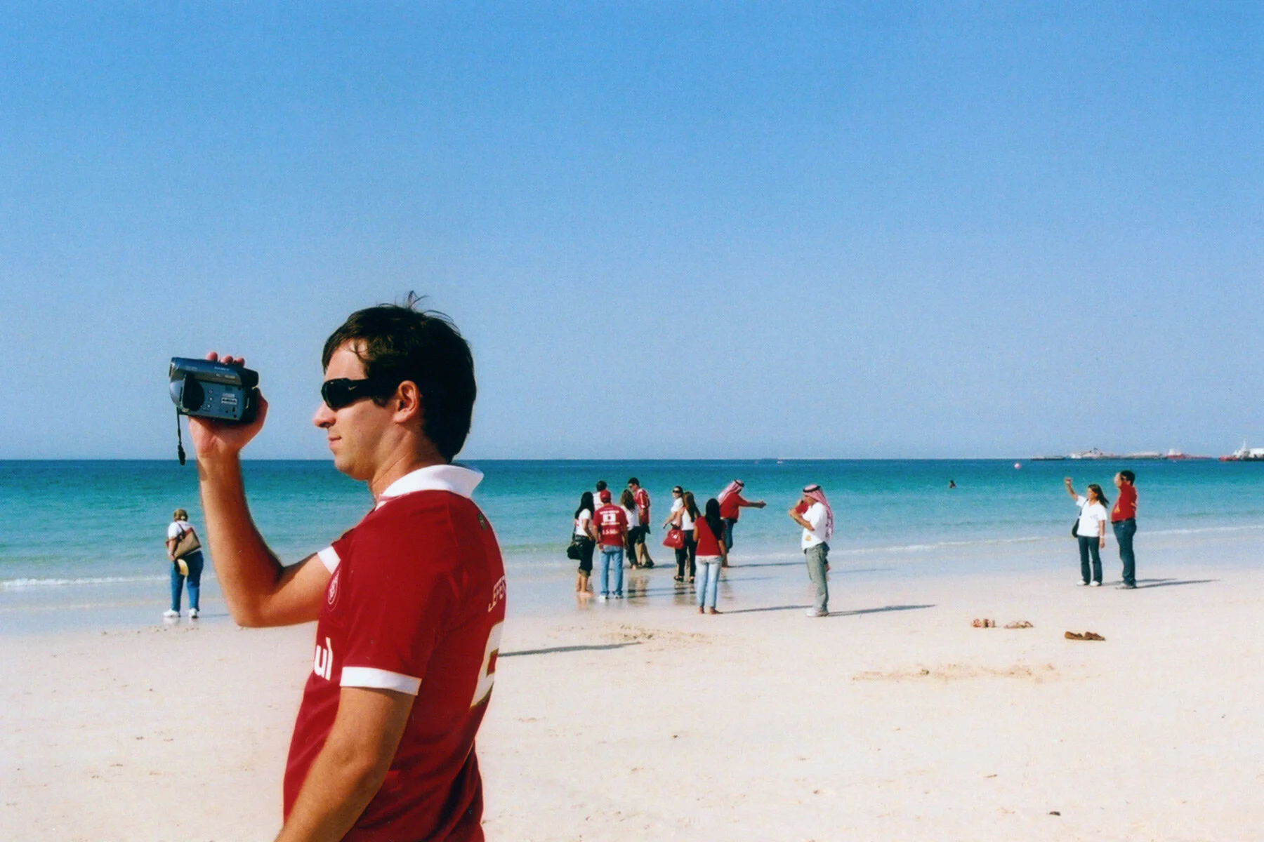 Dubai beach tourist camera.jpg
