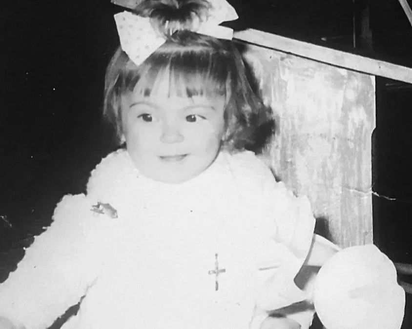 Black and white photo of Nicky as a baby