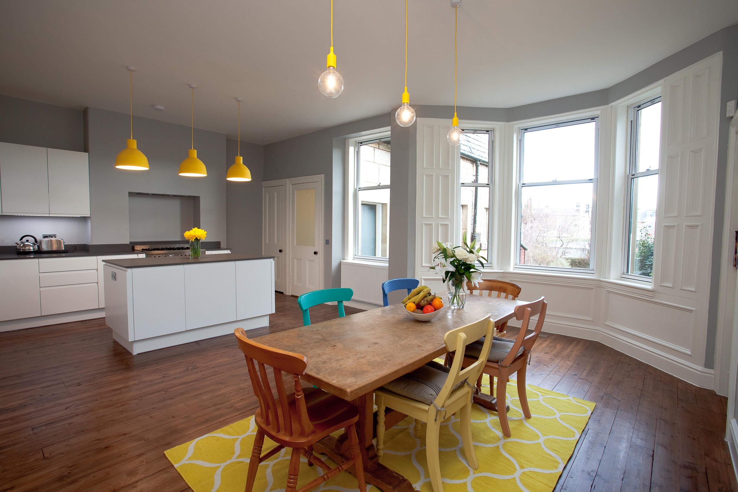  A structural wall was removed to form an open-plan kitchen/ dining room. 