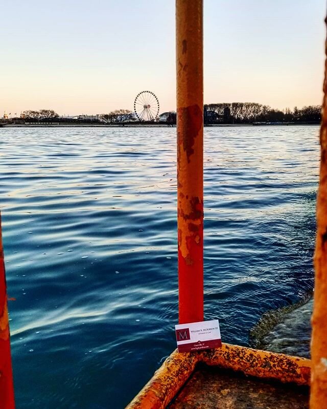 A corroding steel ladder,  a lake soon to be frozen for months, and a distant ferris wheel.... could these things be more disconnected in such proximity?  Or.... maybe they aren't so disconnected after all....
In legal matters,  seemingly unconnected