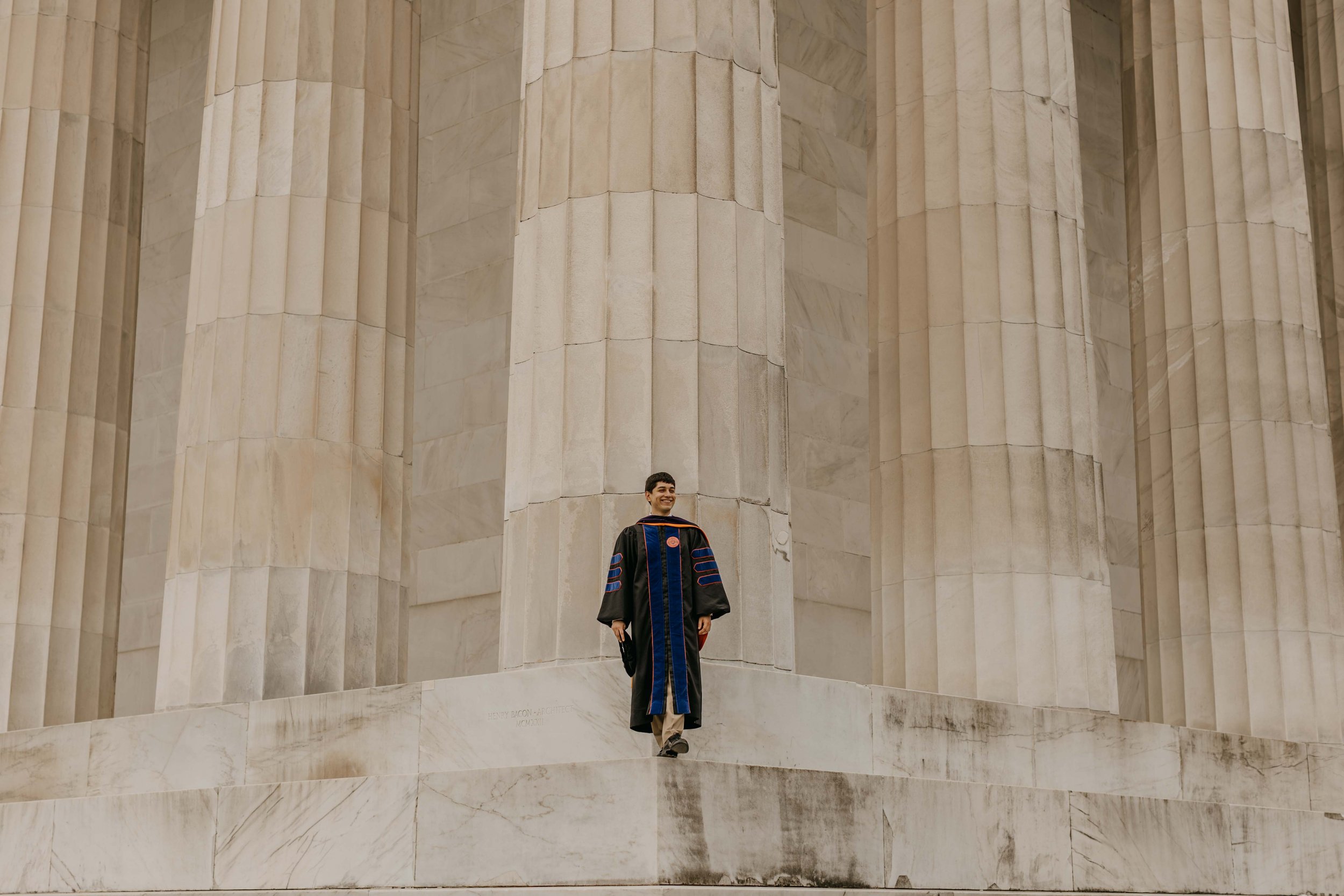 A law student's senior graduation photos at the Lincoln Memorial in Washington DC