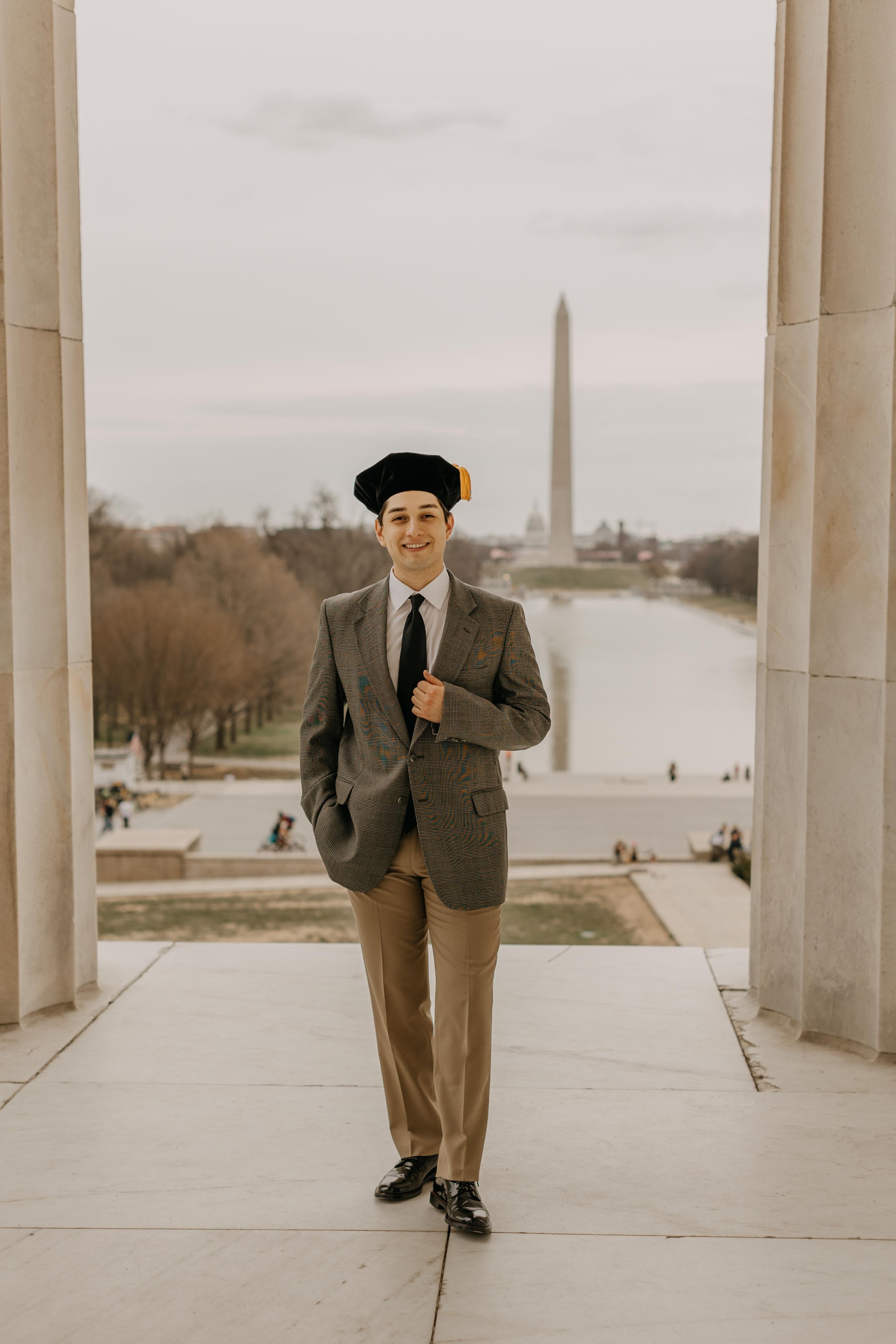 A law student's senior graduation photos at the Lincoln Memorial in Washington DC