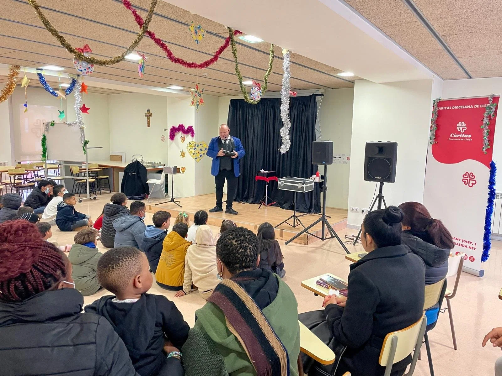 Una tarda de xocolata i joguines per viure el Nadal plegats