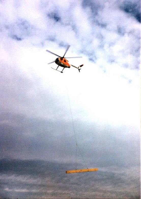By the summer of 1985, after months of planning and preparation, the building materials were flown into the lodge site.