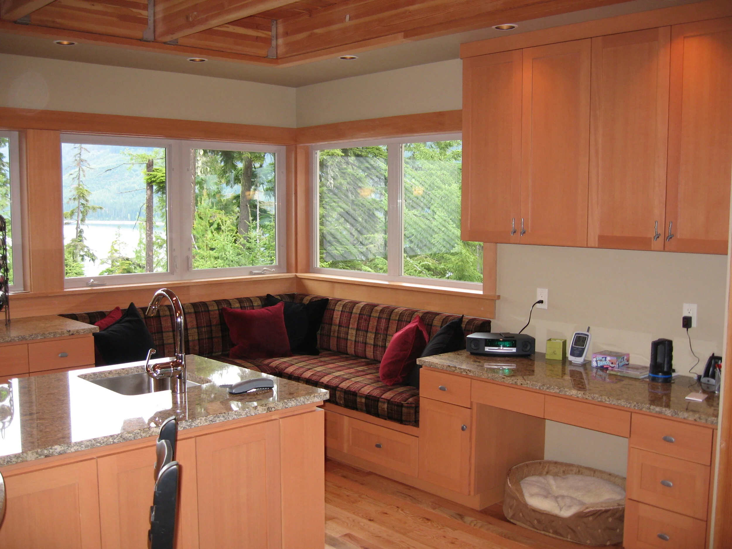 Built-in Couch and Desk next to Kitchen