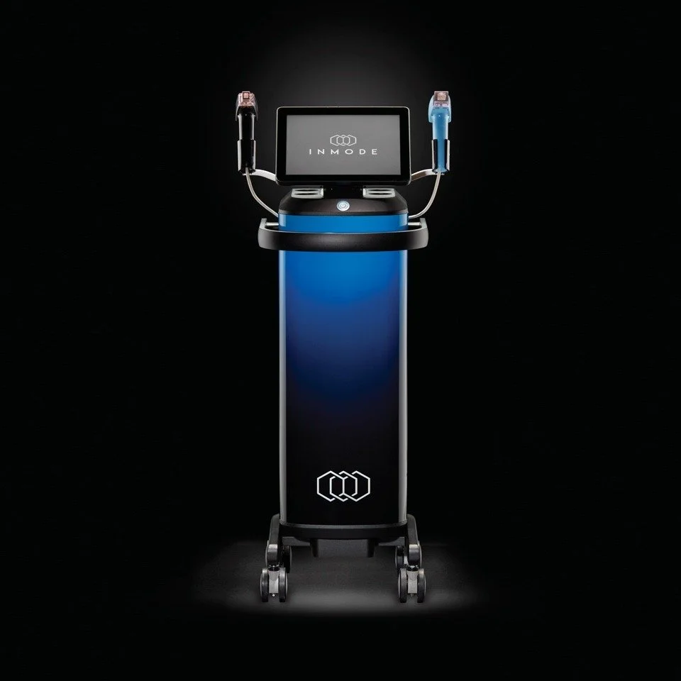 Medical or beauty device with a touchscreen display and two attached handpieces, mounted on a blue and black mobile cart against a black background.