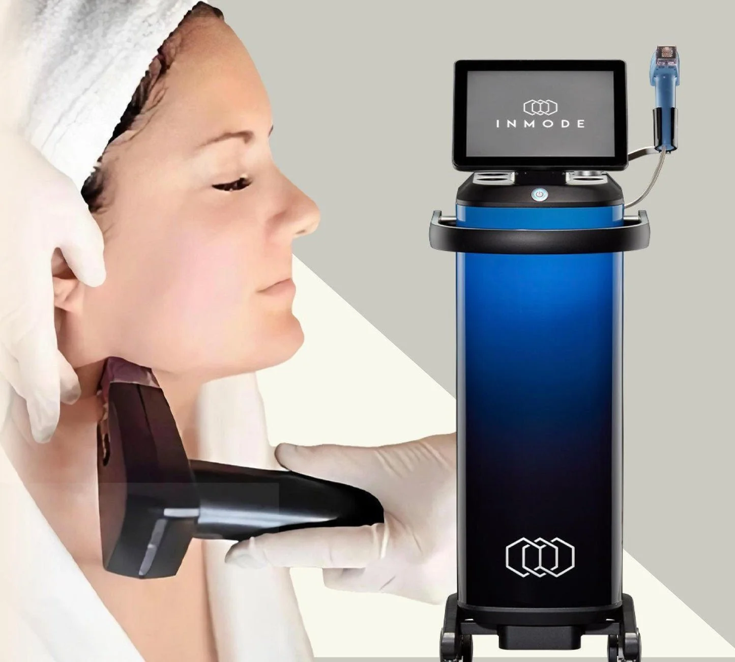 A woman receiving a facial treatment from a handheld device in a clinic setting, with a medical professional using gloves to handle the device and a machine with a screen labeled 'INMODE' nearby.
