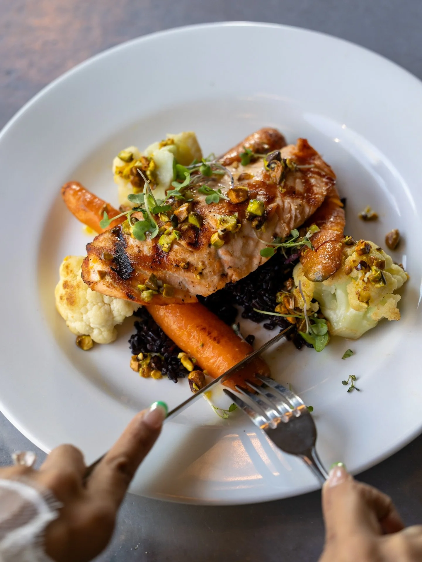 NEW ON MENU: Grilled salmon, forbidden rice, roasted veg, and a bright pistachio-orange salsa. Simple, fresh, and gluten-free.