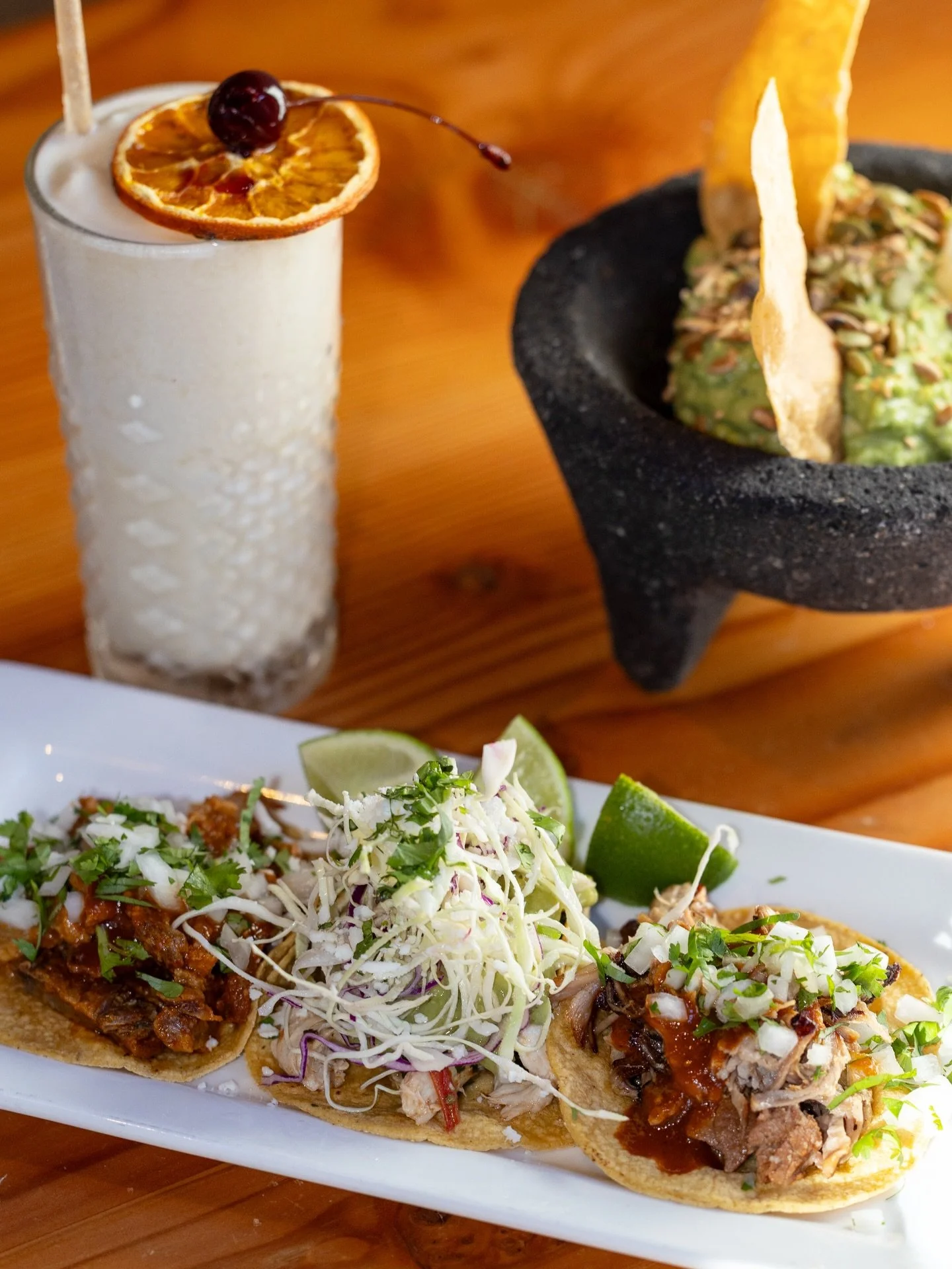 A trio of tacos, fresh guac, and a perfectly chilled boozy slushie. @centrococina, as always.