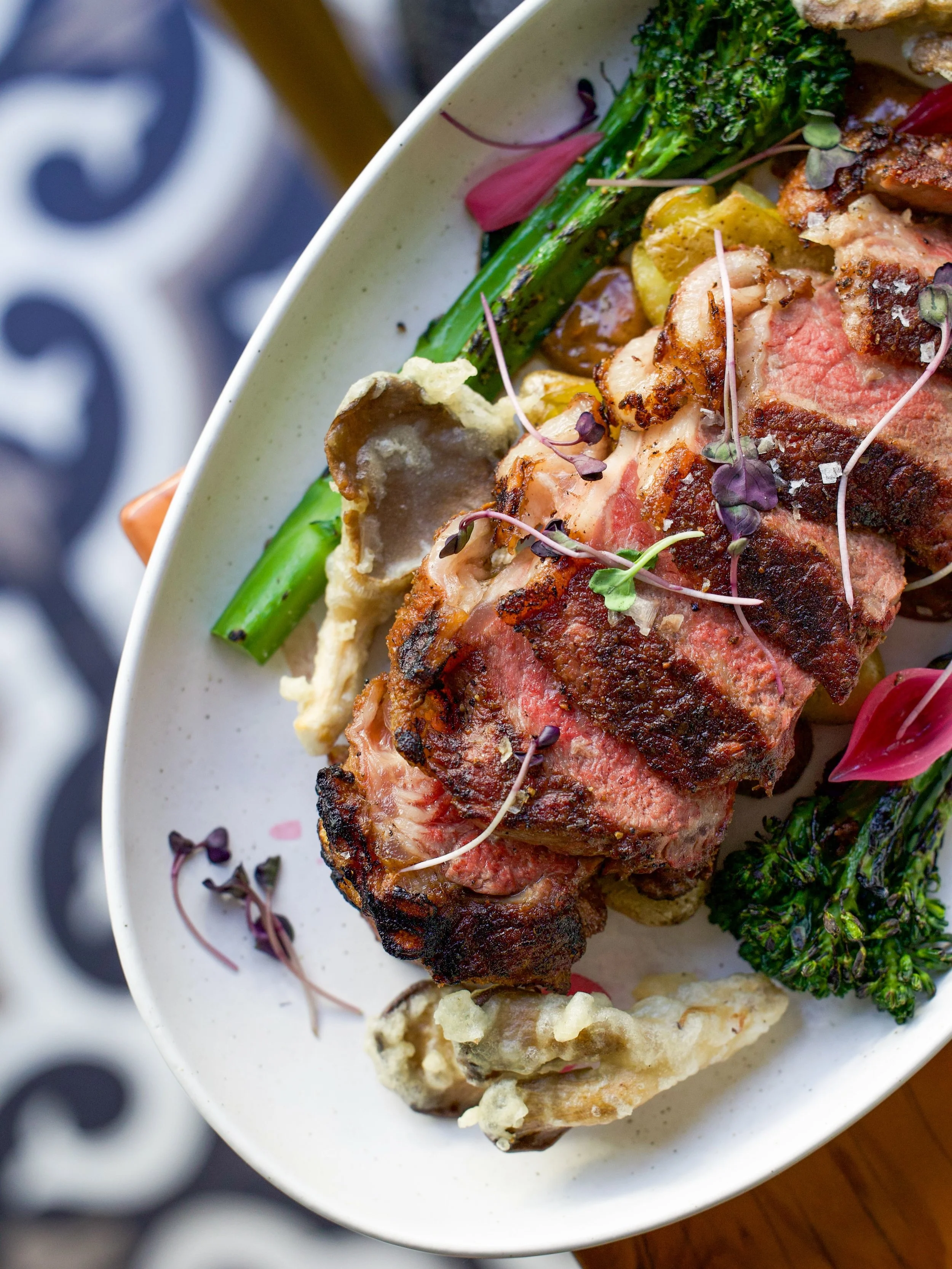 Spring dinners at Paragary&rsquo;s | Flannery New York steak, oven roasted meatballs, and patio season officially in full swing.