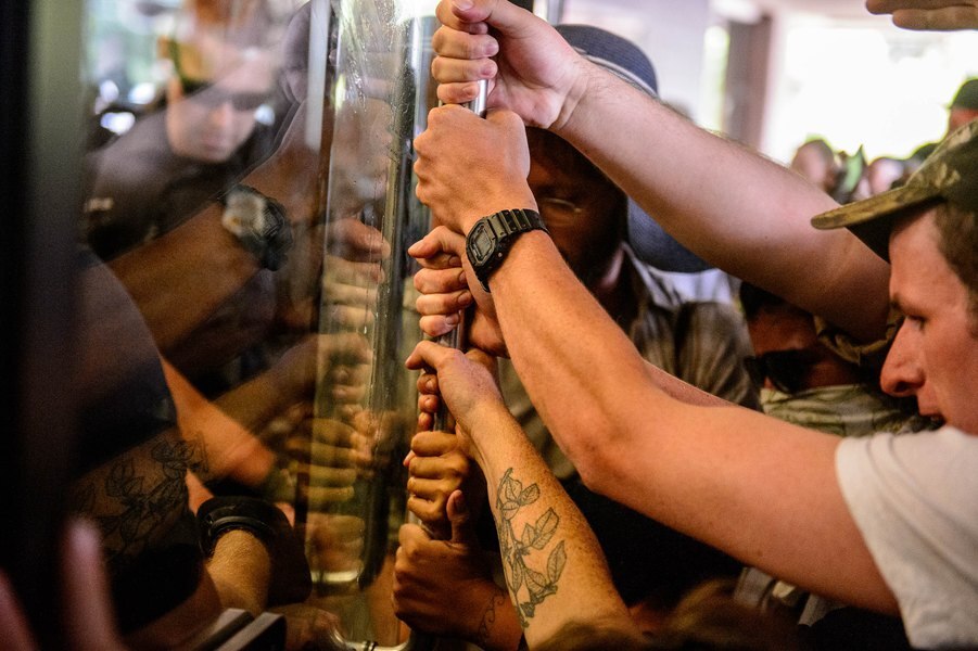 Fourteen people face criminal charges from July confrontation with police over inland port