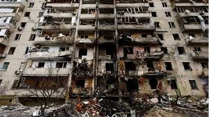 Putin likens Western sanctions to war as Russian assault traps Ukrainian civilians