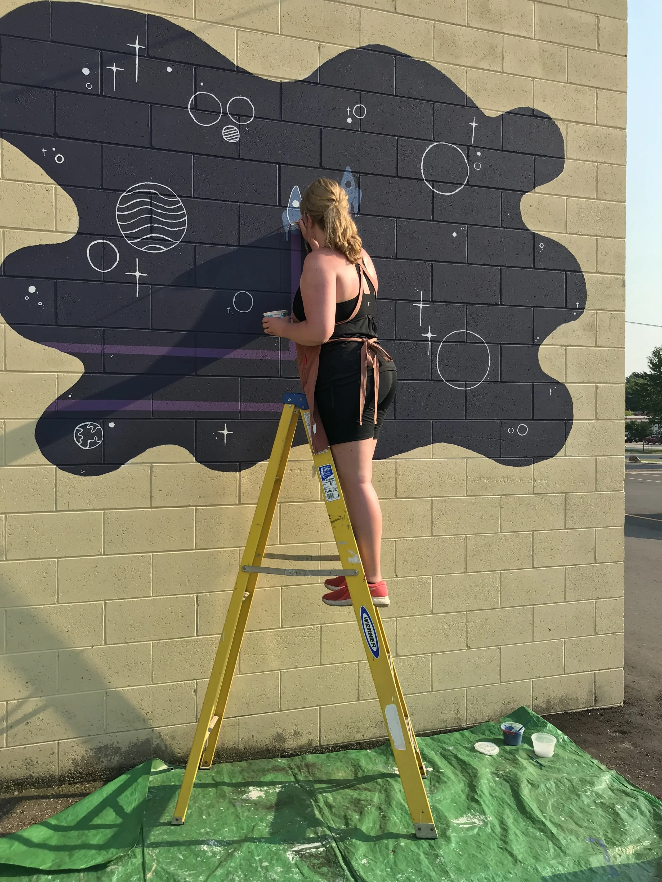 Milwaukee artist, Sam Hanson, paints a custom illustrated mural in Wisconsin. Mural in Waupaca, WI. Milwaukee Muralist | Sam Hanson | @samhansonillo | samhansondoodle.com