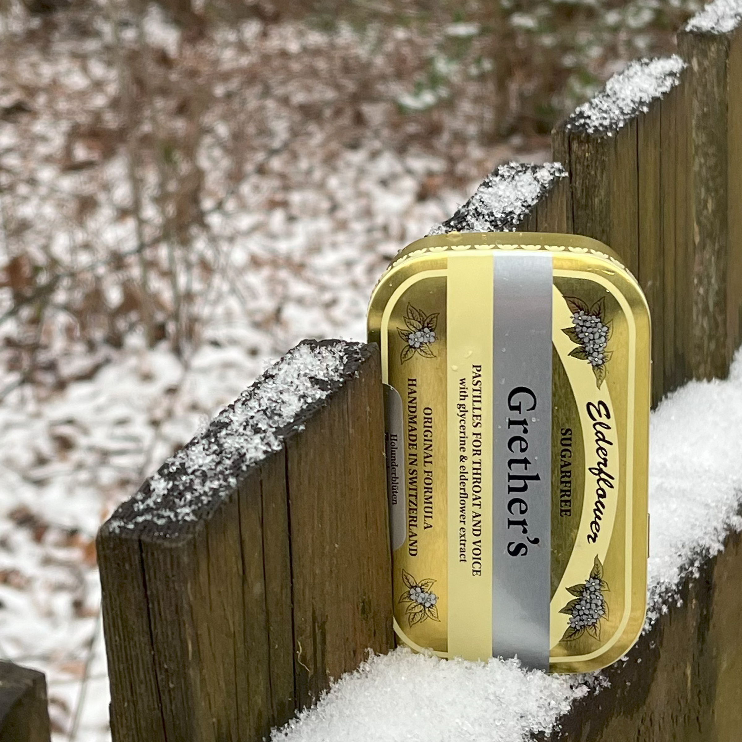 Grether's Elderflower Snowy Fence PNG.png