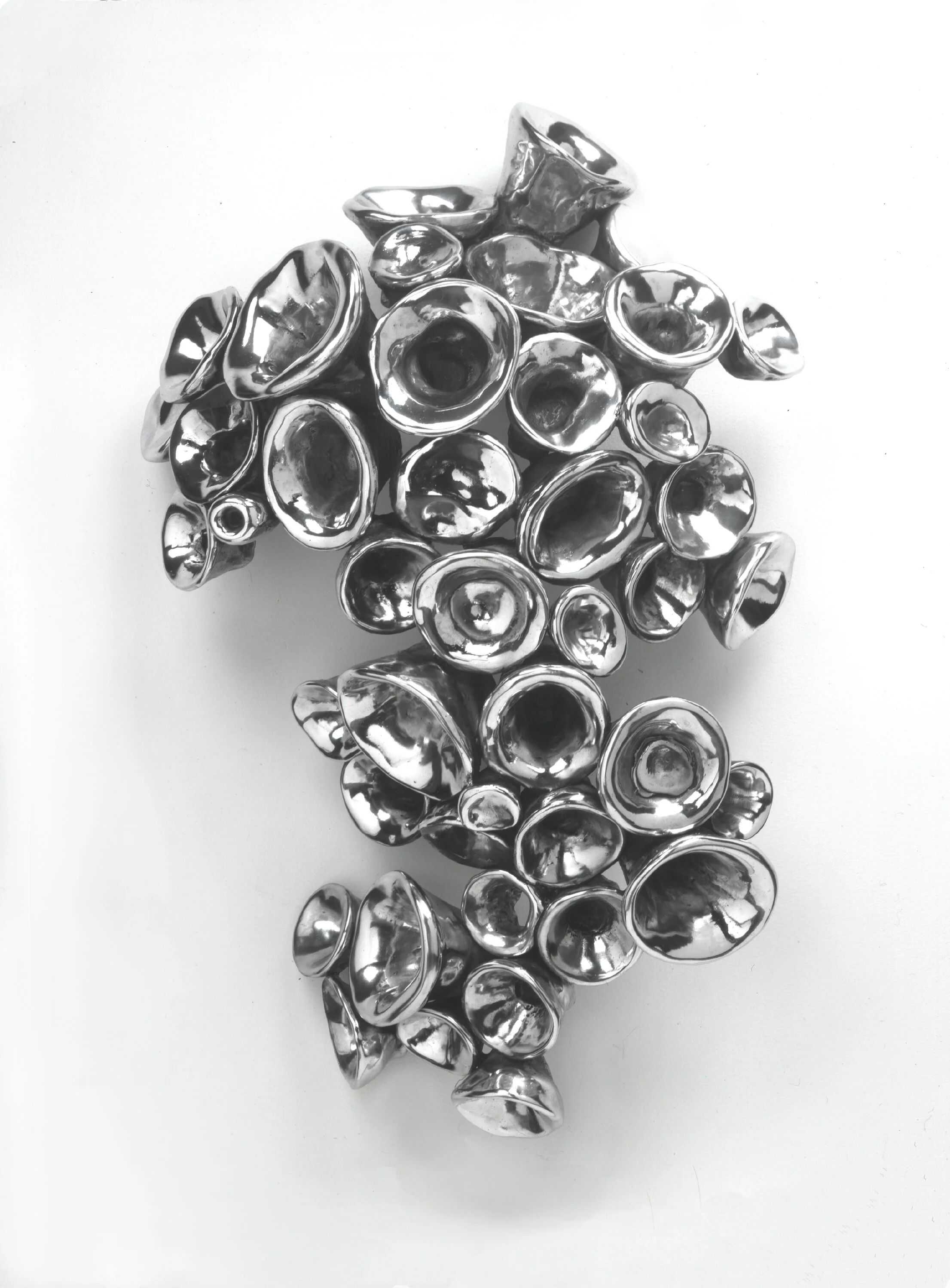  Sound And Vision, 2002 Polished aluminum 40” x 26” x 7” 