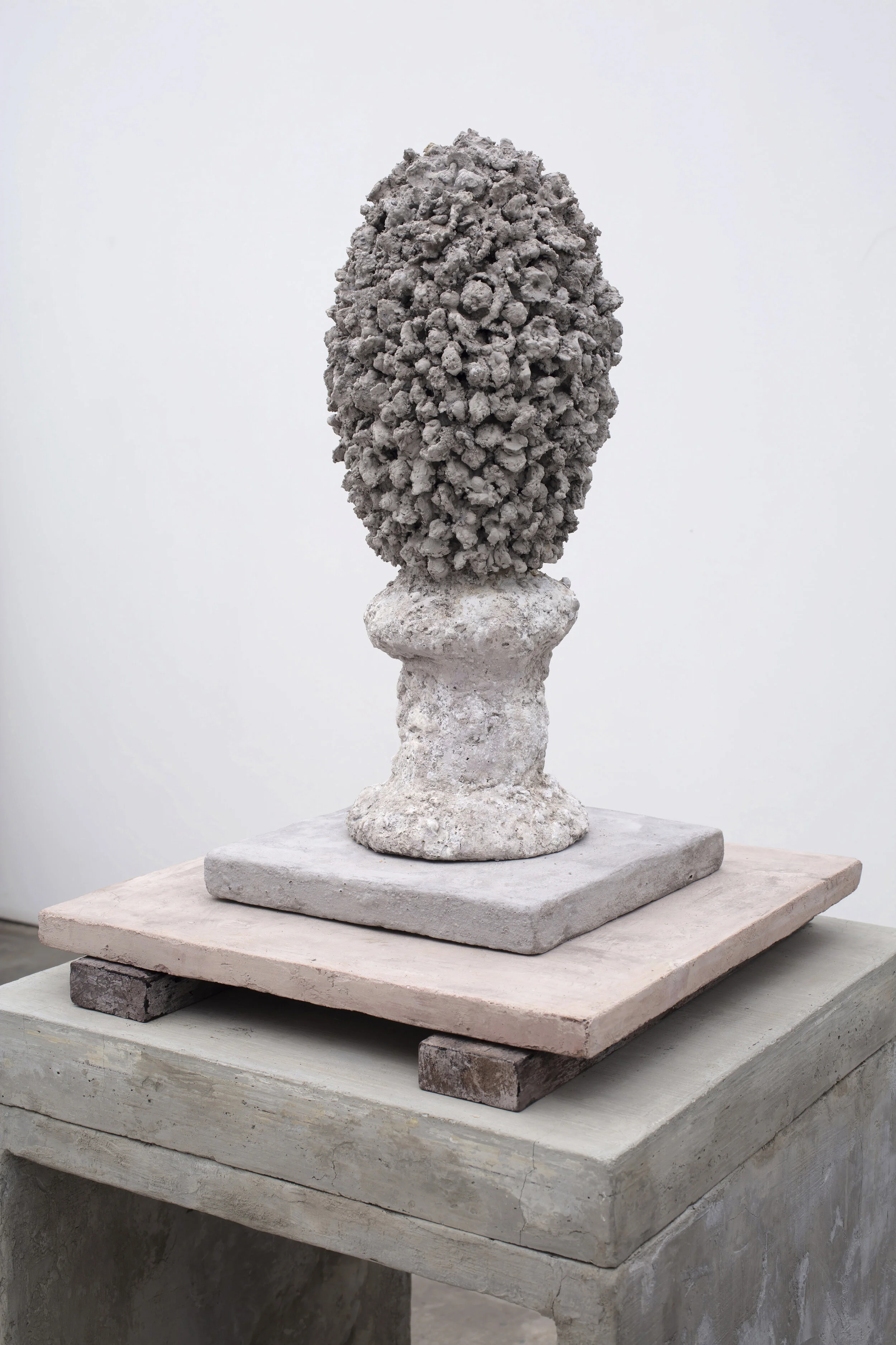  Petralized IV (angle), 2020 Refractory cement, aluminum, ceramic, styrene foam, pigmented cement and wood 28” x 22” x 21” 
