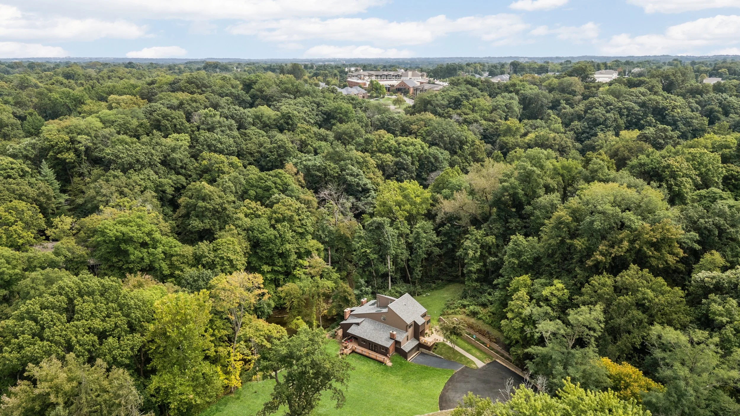 Not your average Chesterfield home. 👀

This one was built by St. Louis architect Tom Hall as his own personal residence in 1974 &mdash; and more than 50 years later, it still stands out.

Tucked into the trees with water just steps from the back dec