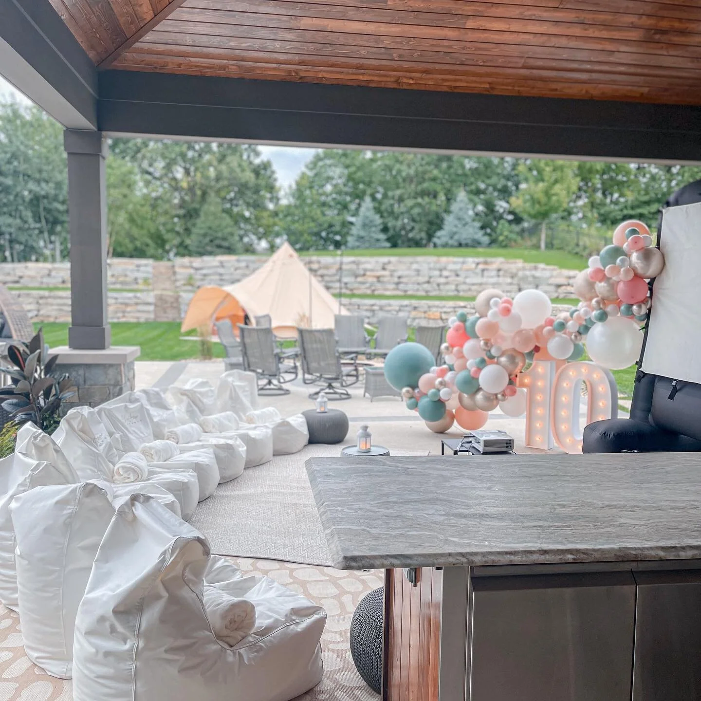 10th birthday celebration with a movie night &amp; star glamping 😍 

(I wish we had a nighttime shot of this one - we did rows of bistro lighting in the yard, which would be *magic* at night ✨)