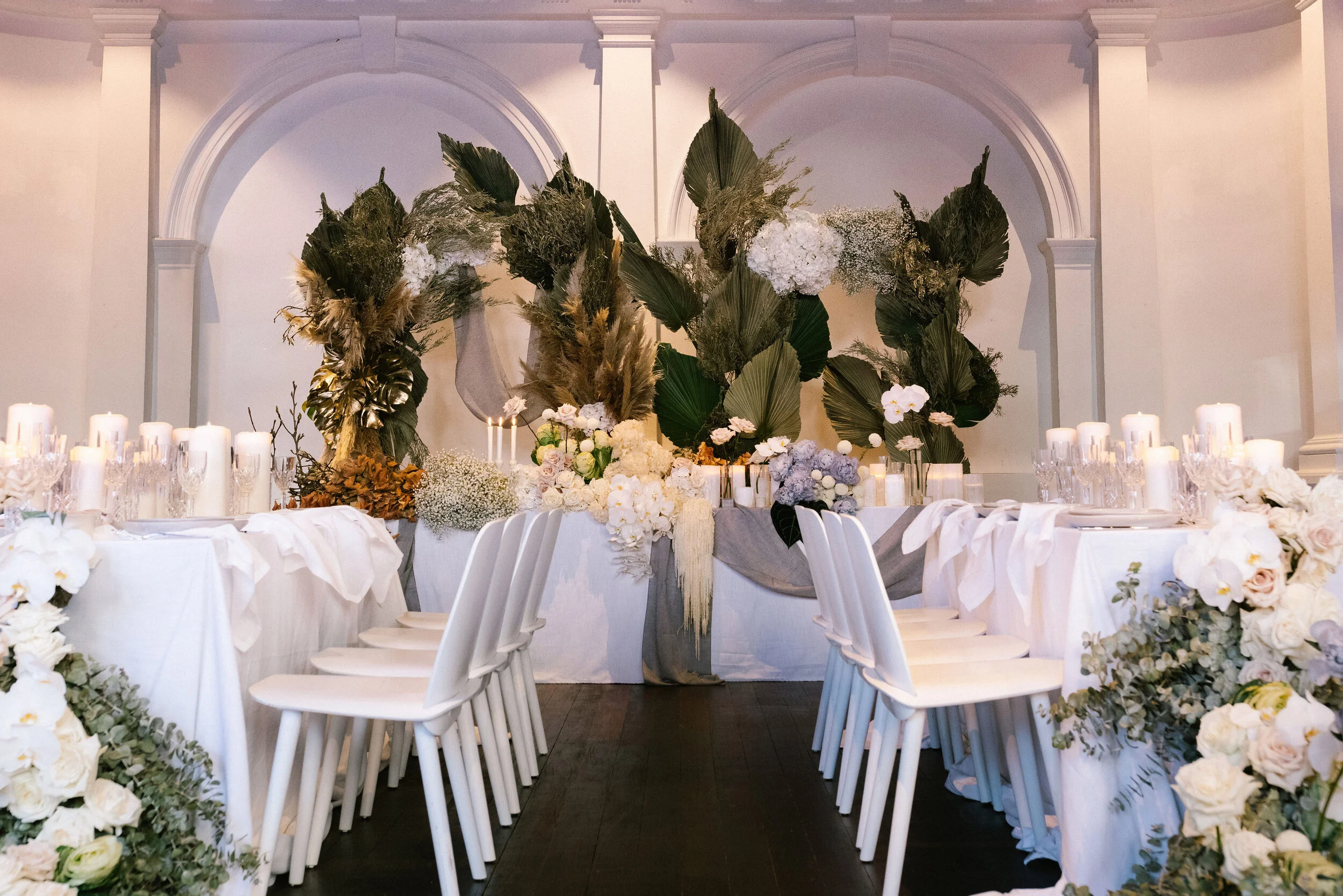  Venue: Moana Hall  Stylist &amp; Florals: Travelling Jaspers (Amber Jasper)  Furniture Hire: M Events Hire  Tableware: Euphoric Events  Food: Fraser’s Events &amp; Catering 