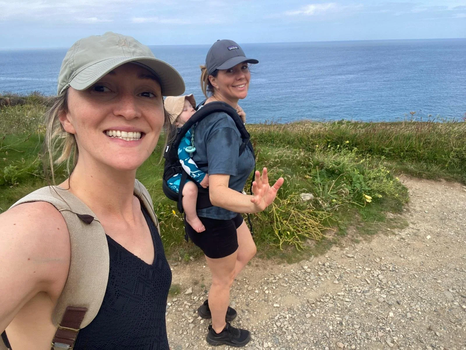 Parents enjoying a seaside walk after better sleep