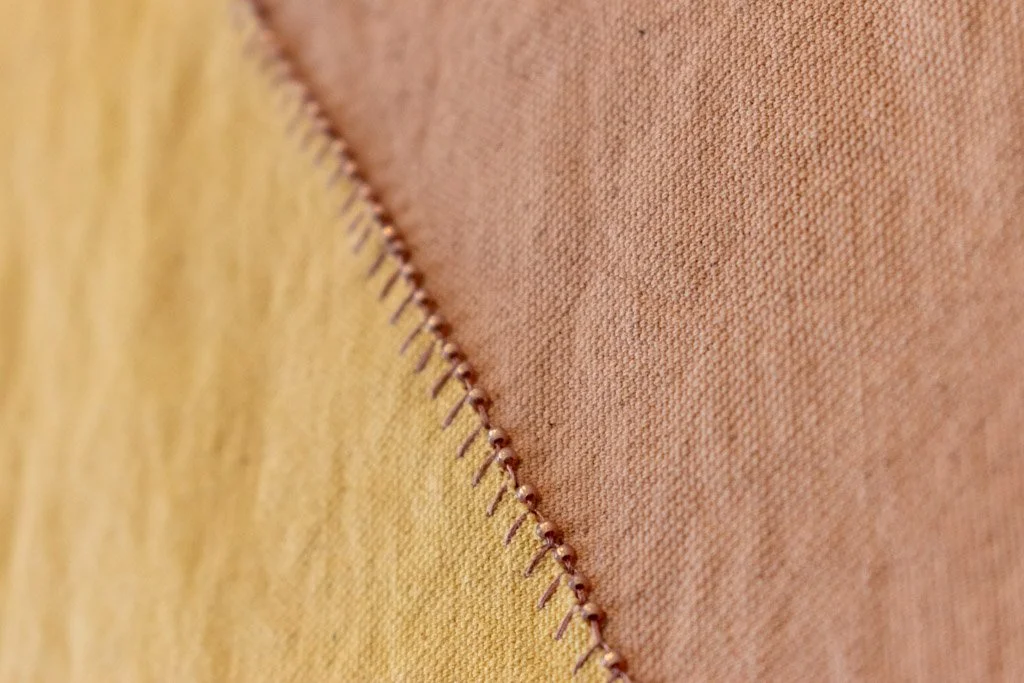   Spring,  Detail ,  Cotton canvas, natural dye (walnut, cutch, avocado pits, weld, modulated with iron), welded steel, metal bar, canvas folded into fours and cut once, folded in half and cut twice, unfolded and rearranged, hand sewn back together w