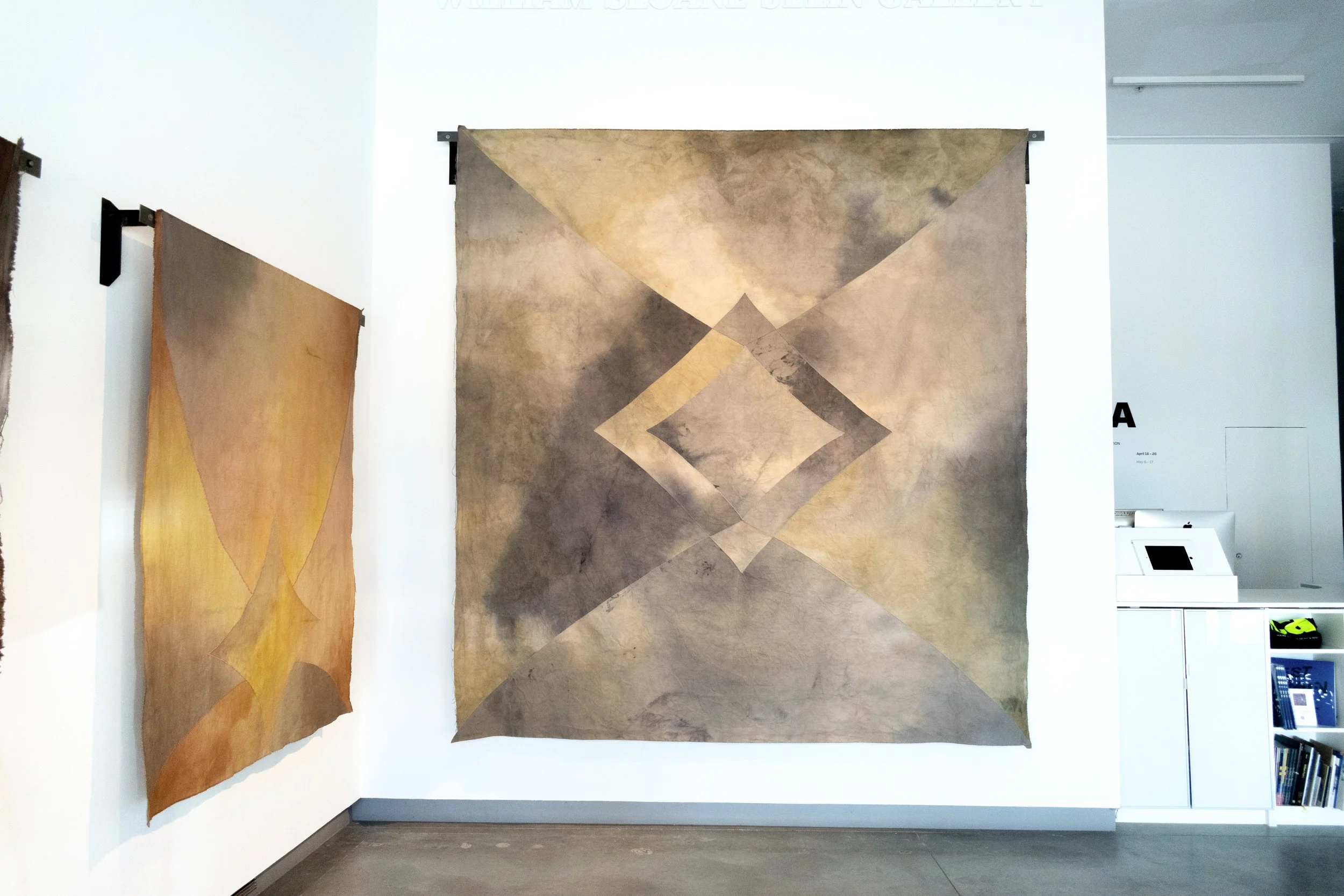   Winter , Cotton canvas, natural dye (logwood, black bean water, pomegranate, walnut, modulated with iron), welded steel, metal bar, folded into fours and cut three times, hand sewn back together with glass beads, 2025, 9.1ft x 9.8 ft. 