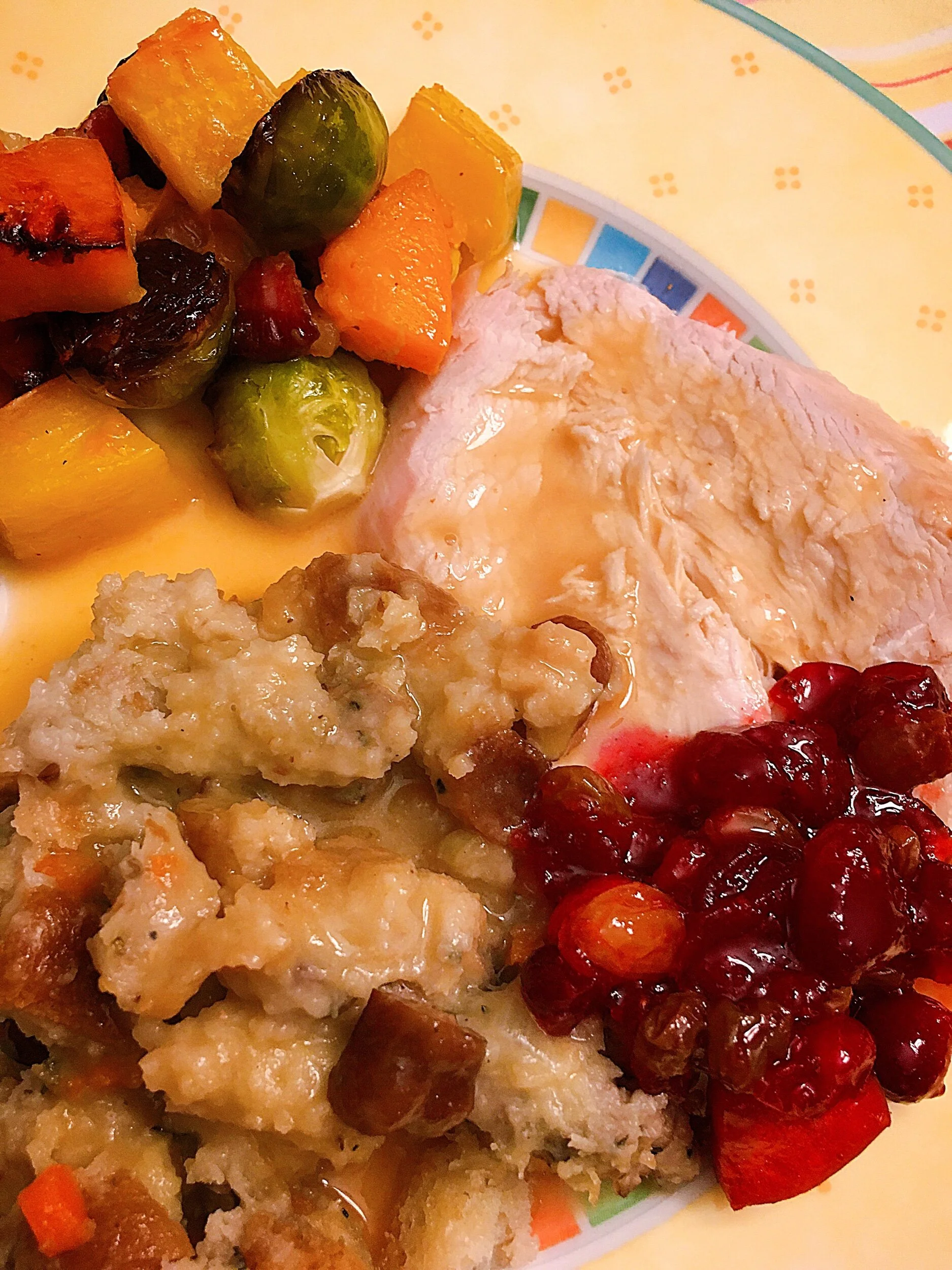 With turkey, stuffing, gravy, and some roasted vegetables!