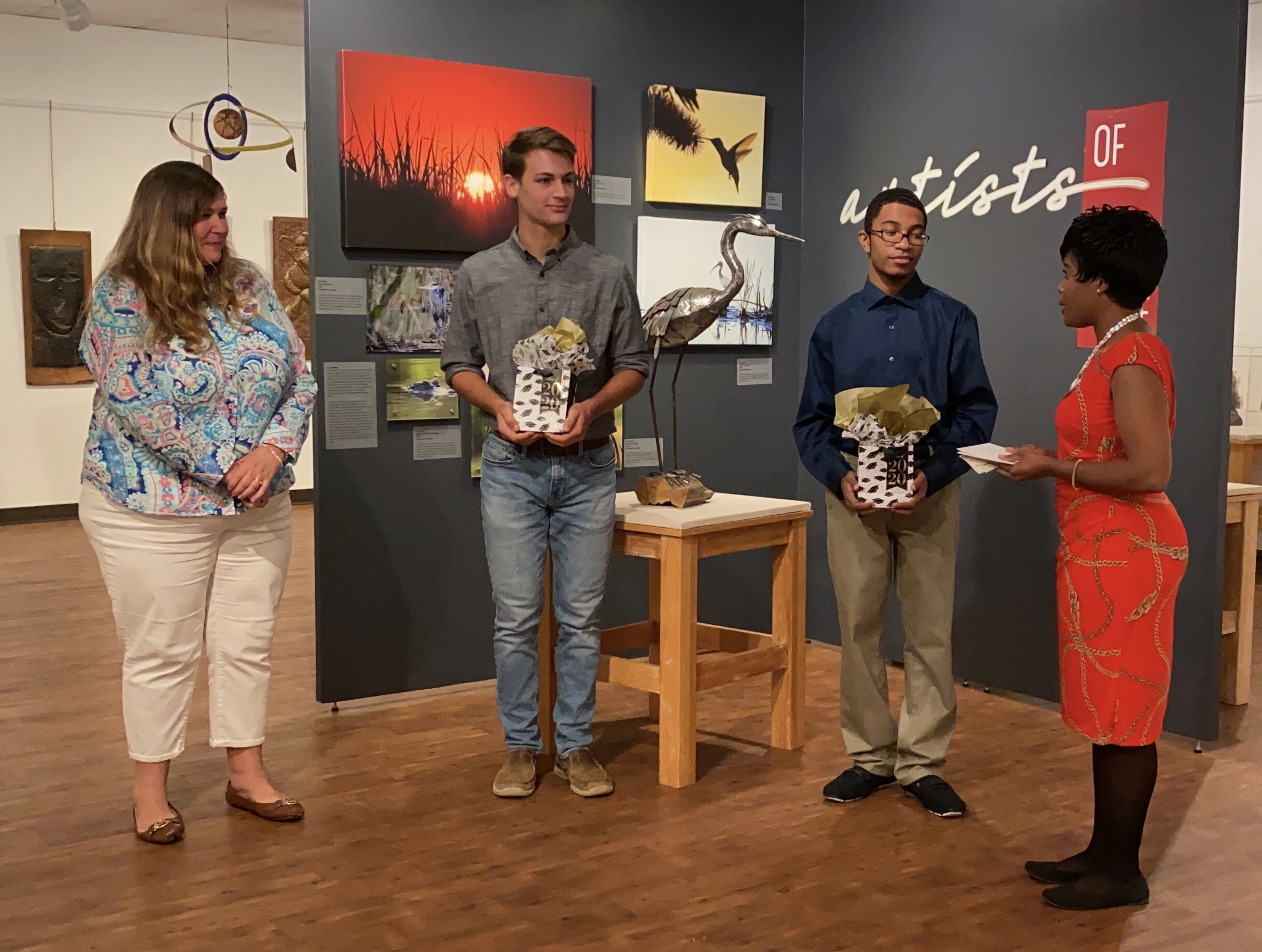 At the West Baton Rouge Museum, Mr. Beau and Mr. Rudolph were honored with gifts courtesy of AMOA, Raising Cane's, Walmart, and Albertson's!