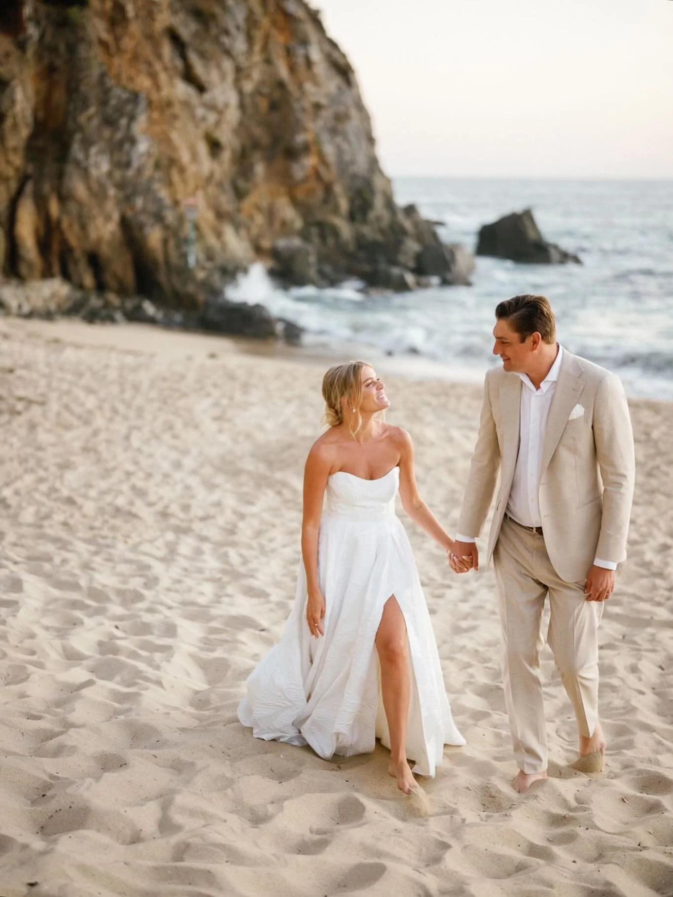 As the ocean becomes their backdrop, we start setting the scene they&rsquo;ll come back to. 

Every part of cocktail hour gets a thoughtful touch. The apps and drinks come together with ease. When the couple returns, everything feels warm, welcoming,