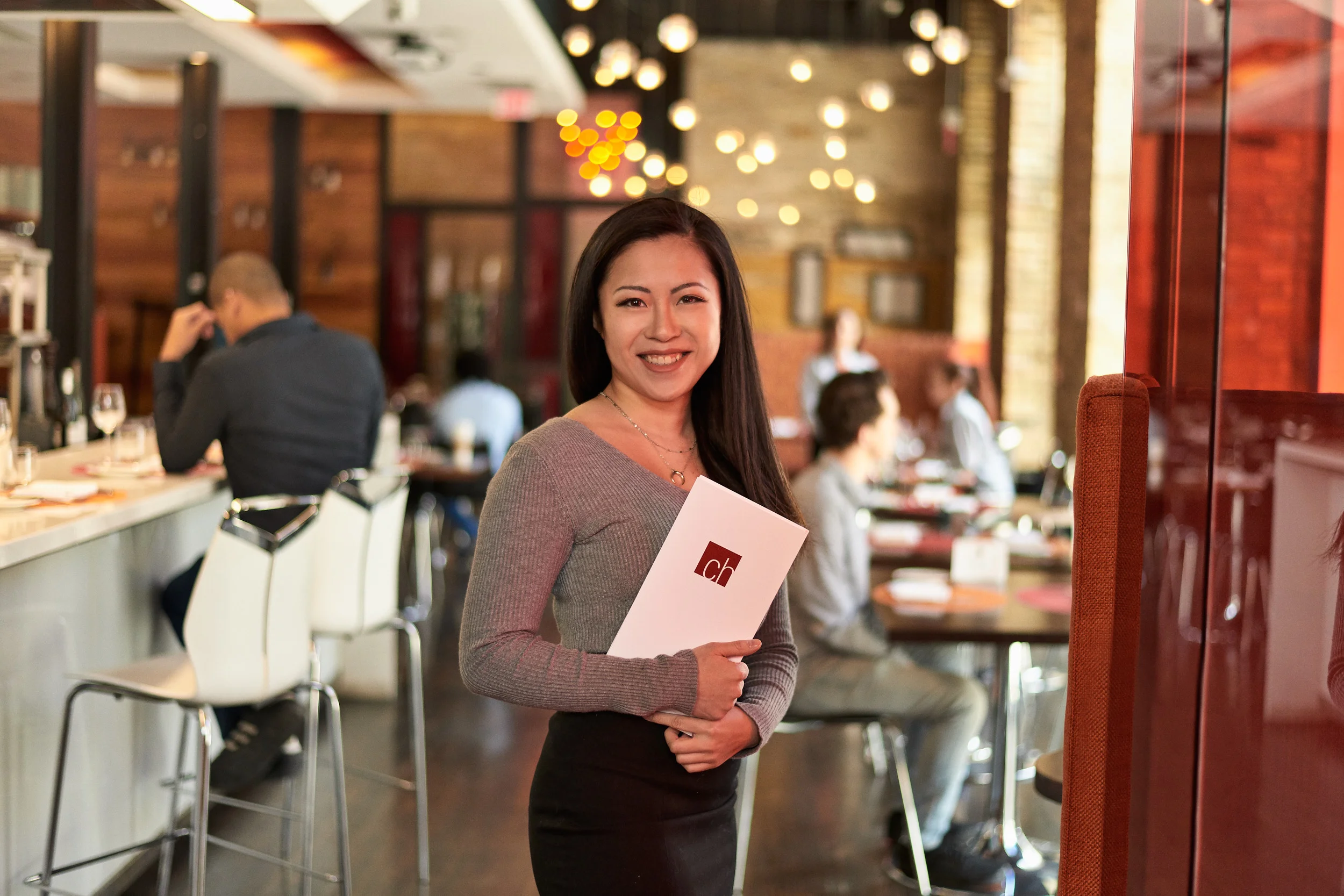 A welcoming host in The Restaurant at The Centre for Hospitality & Culinary Arts, George Brown College, Toronto