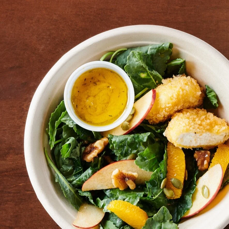 A Café Salad of Fried Goat Cheese, Kale, Apple, Pumpkin Seeds, and Pecans
