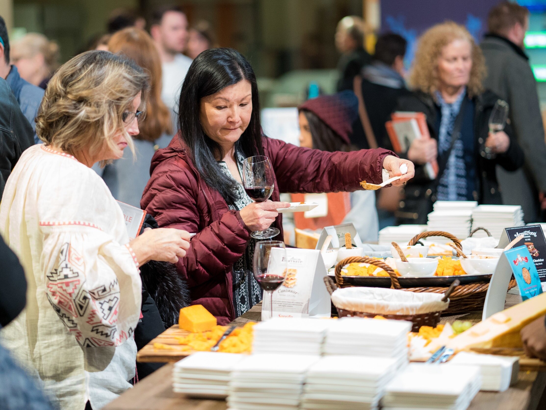 Guests enjoying a food and drink marketplace festival at George Brown College's Centre for Hospitality &amp; Culinary Arts