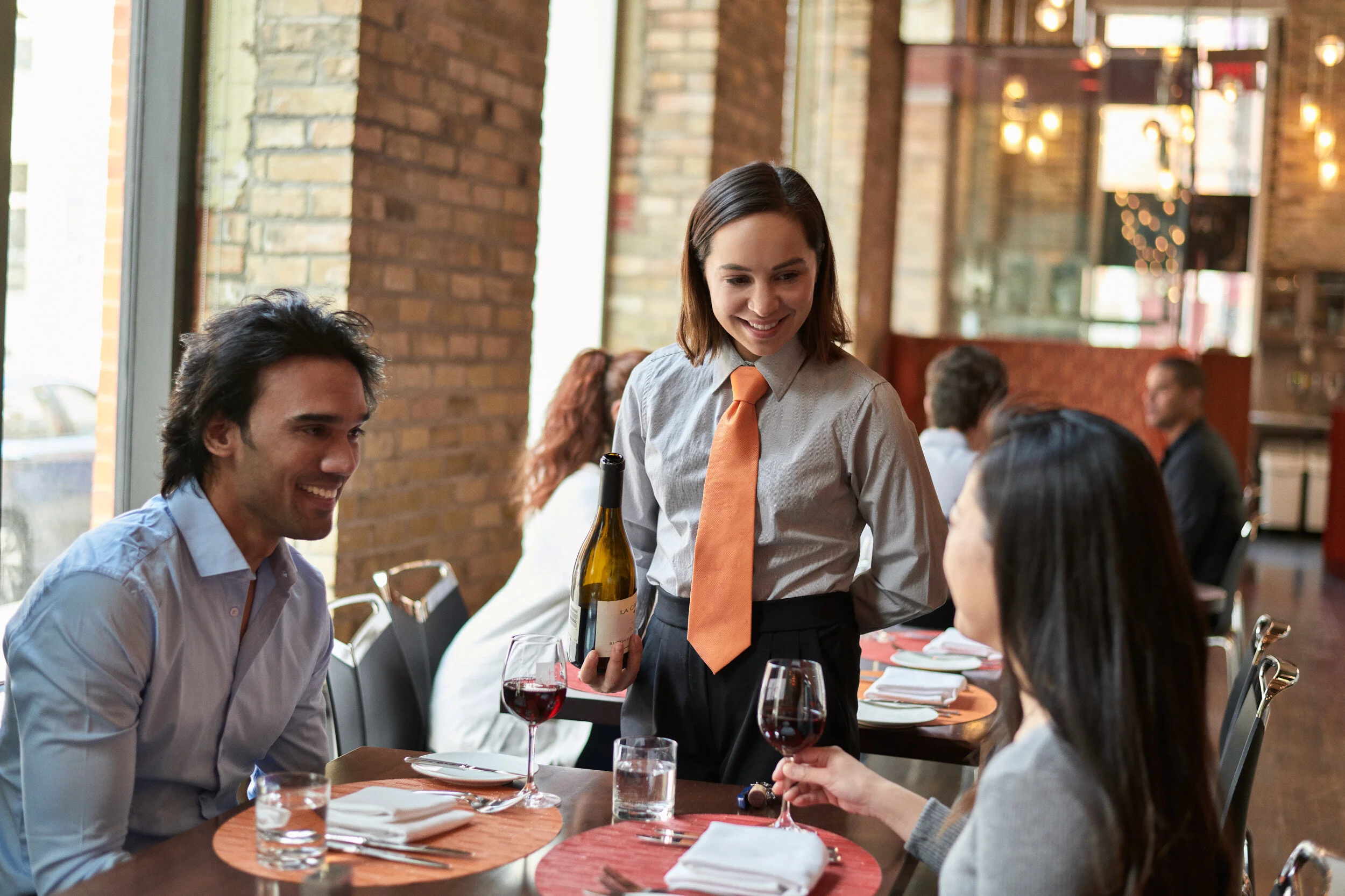 Hospitality students interact with real guests, gaining invaluable experience