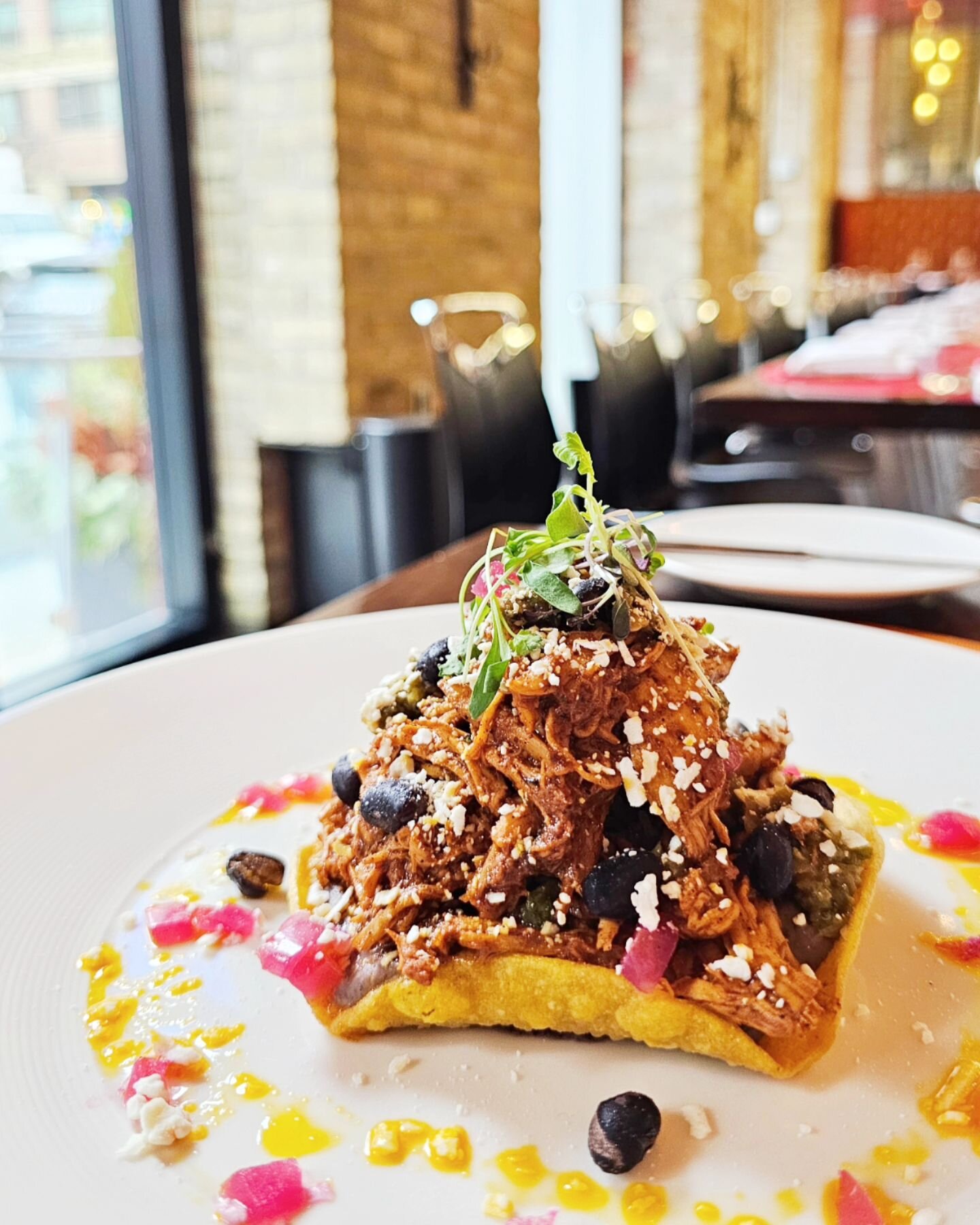 Chicken Pibil
~Achiote, Pickled Red Onion, Charred Salsa Verde, Black Beans, Cotija Cheese

Located in the heart of downtown Toronto, The Chefs' House is a unique, fine-dining experience run by George Brown College culinary and hospitality students 
