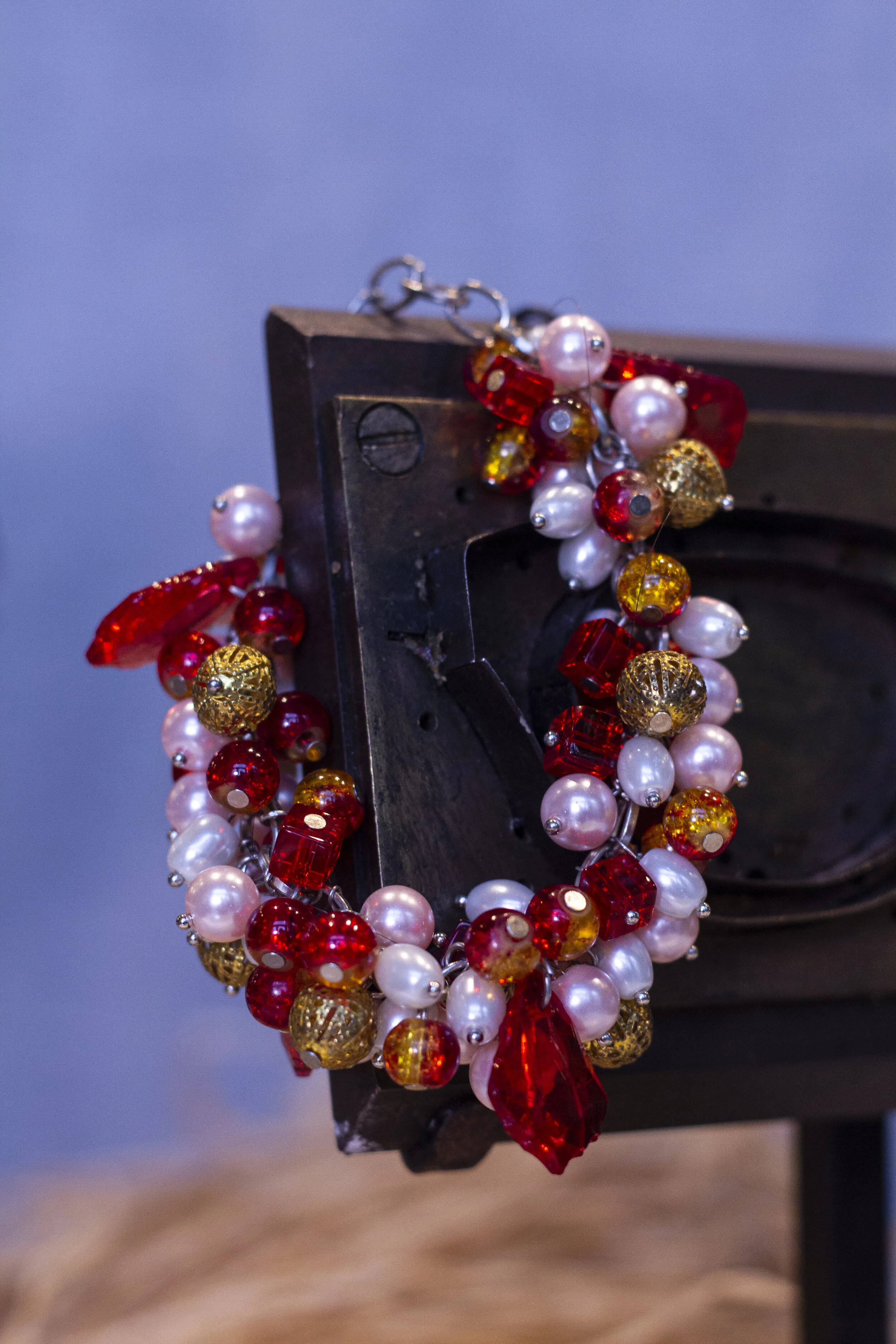 Pink red orange bead bracelet