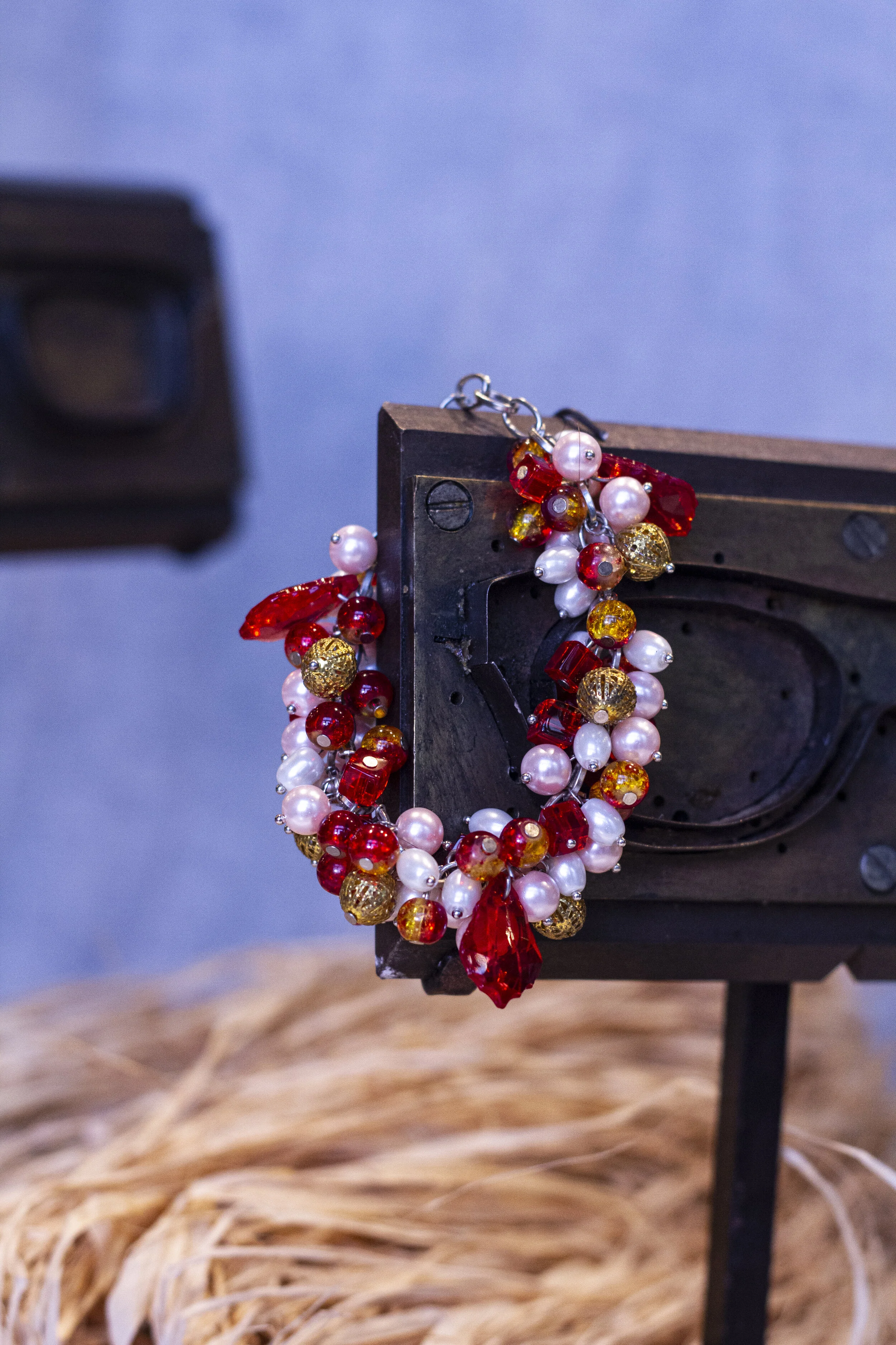 Pink red orange bead bracelet