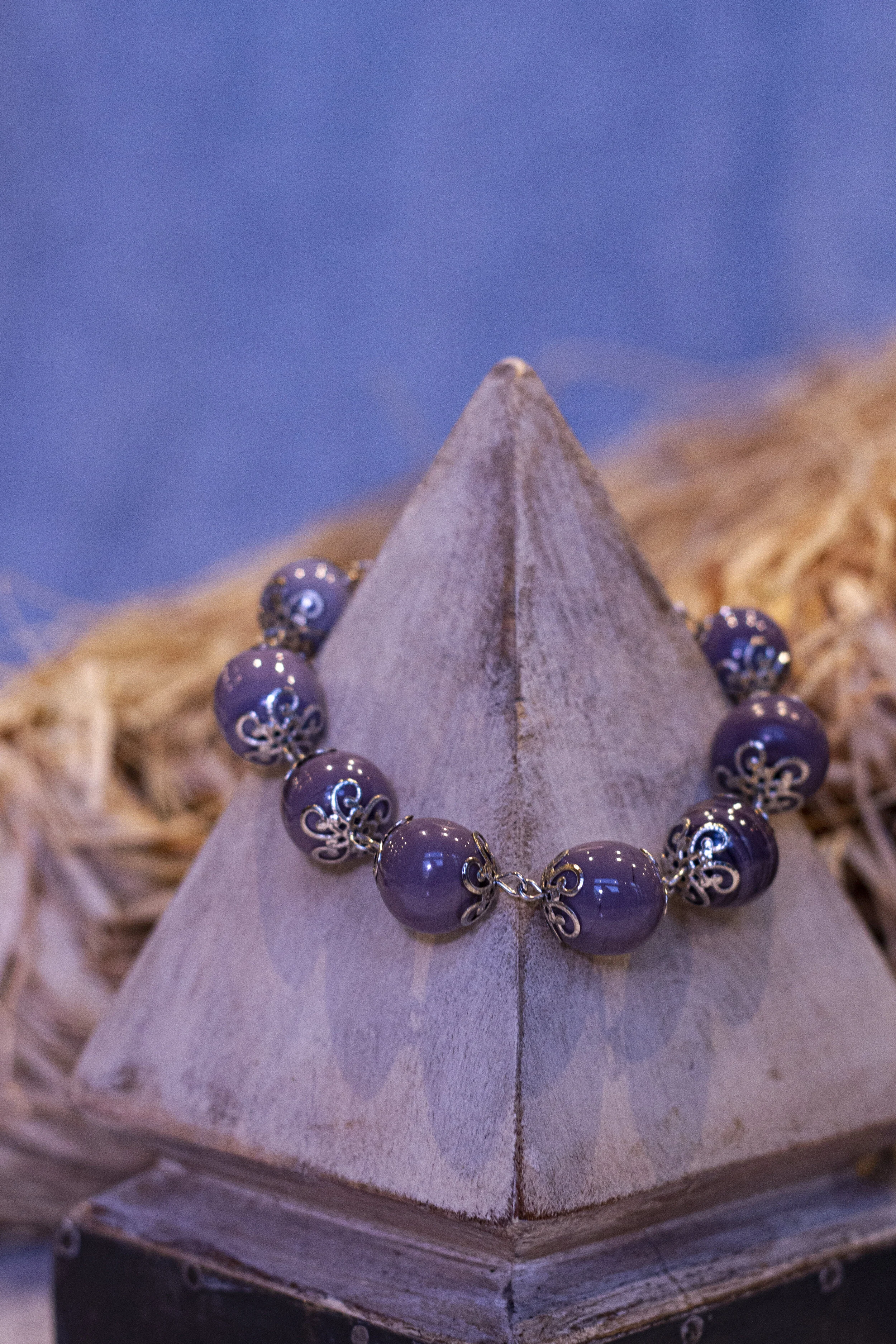 purple and gold ball bracelet