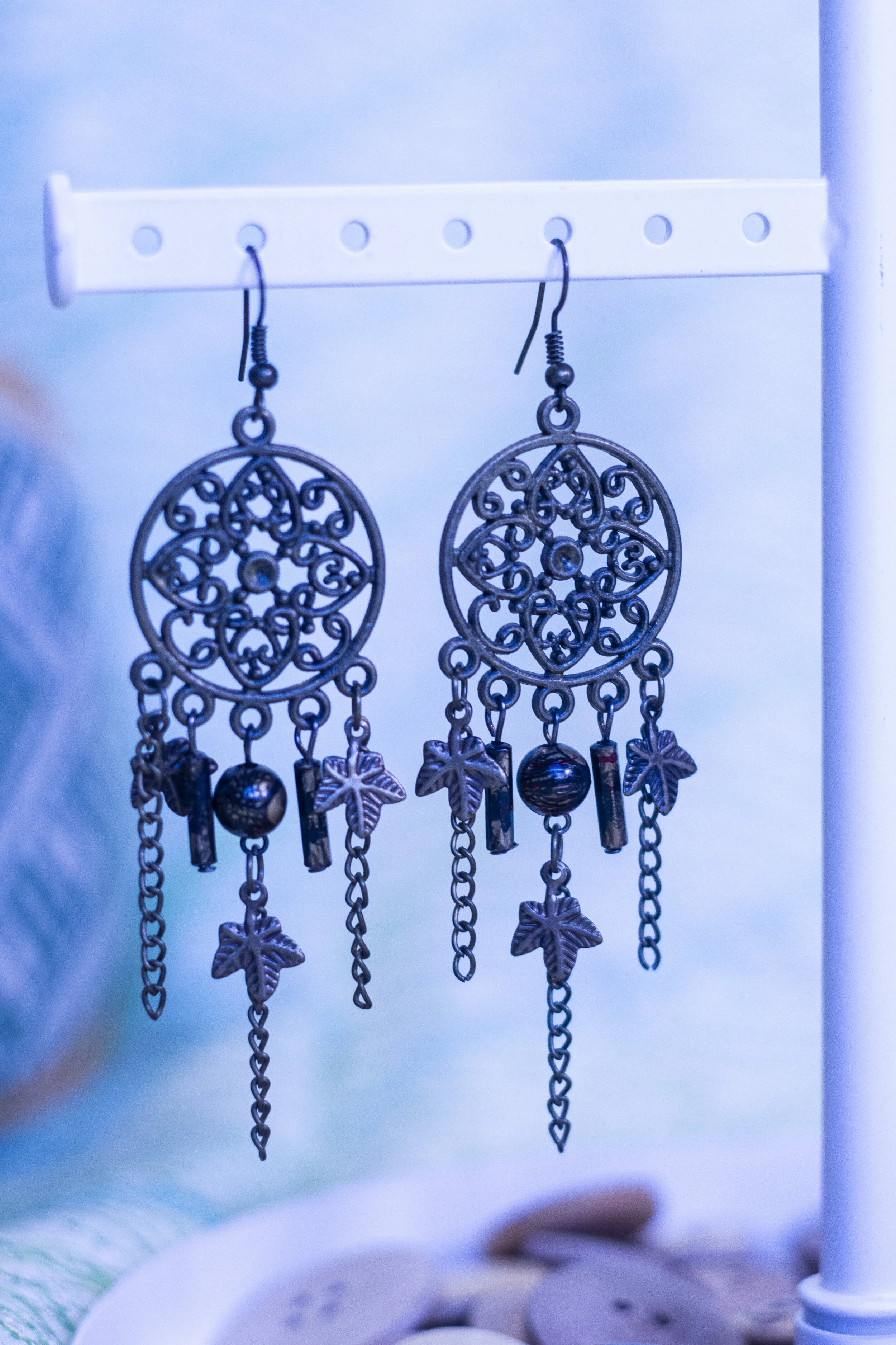 blue long earrings with palm trees