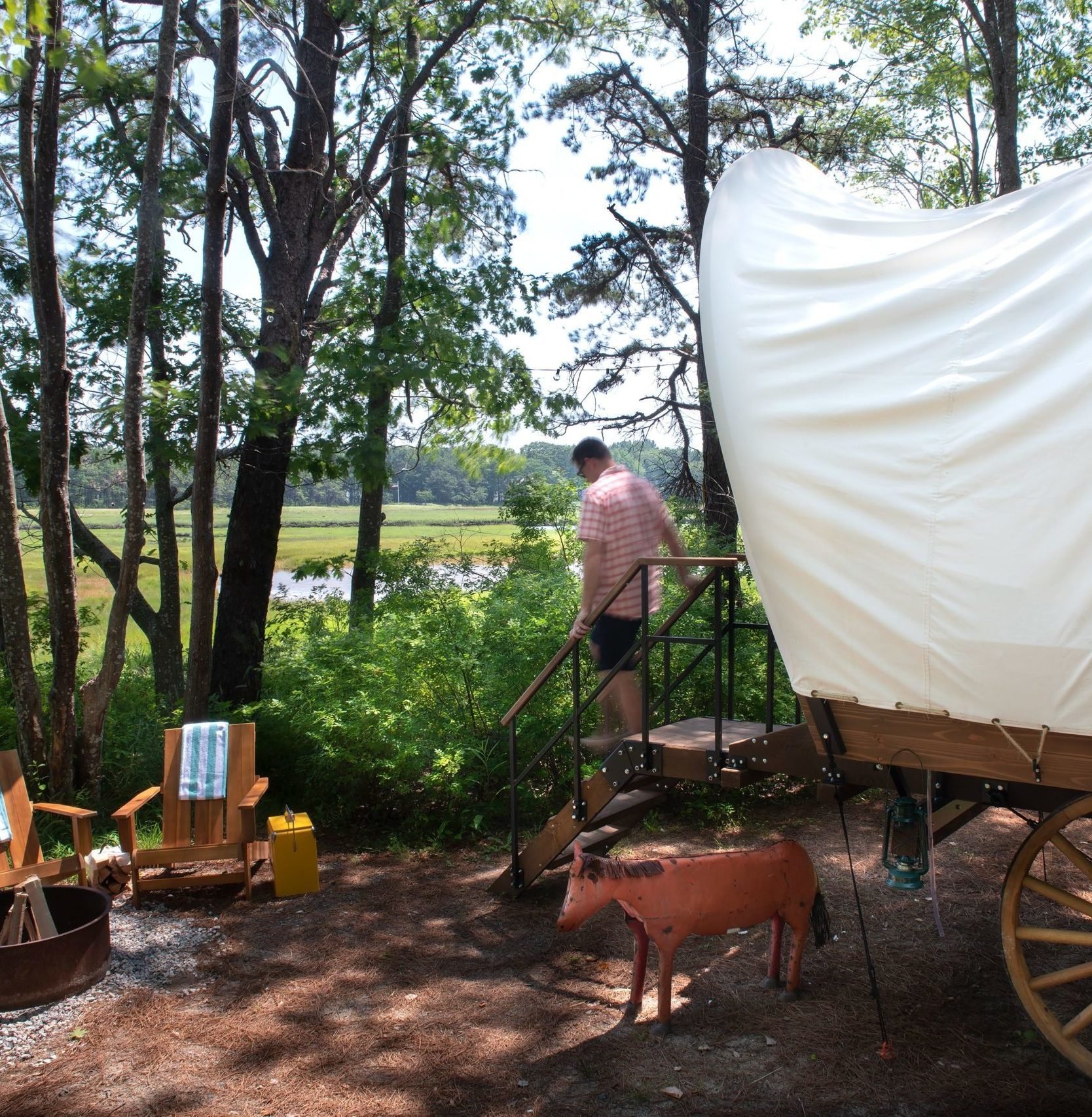 Sandy-Pines-Conestoga-Wagon-Wild-Blue-Yonder-exterior-by-Douglas-Merriam-scaled-e1624885657550.jpeg